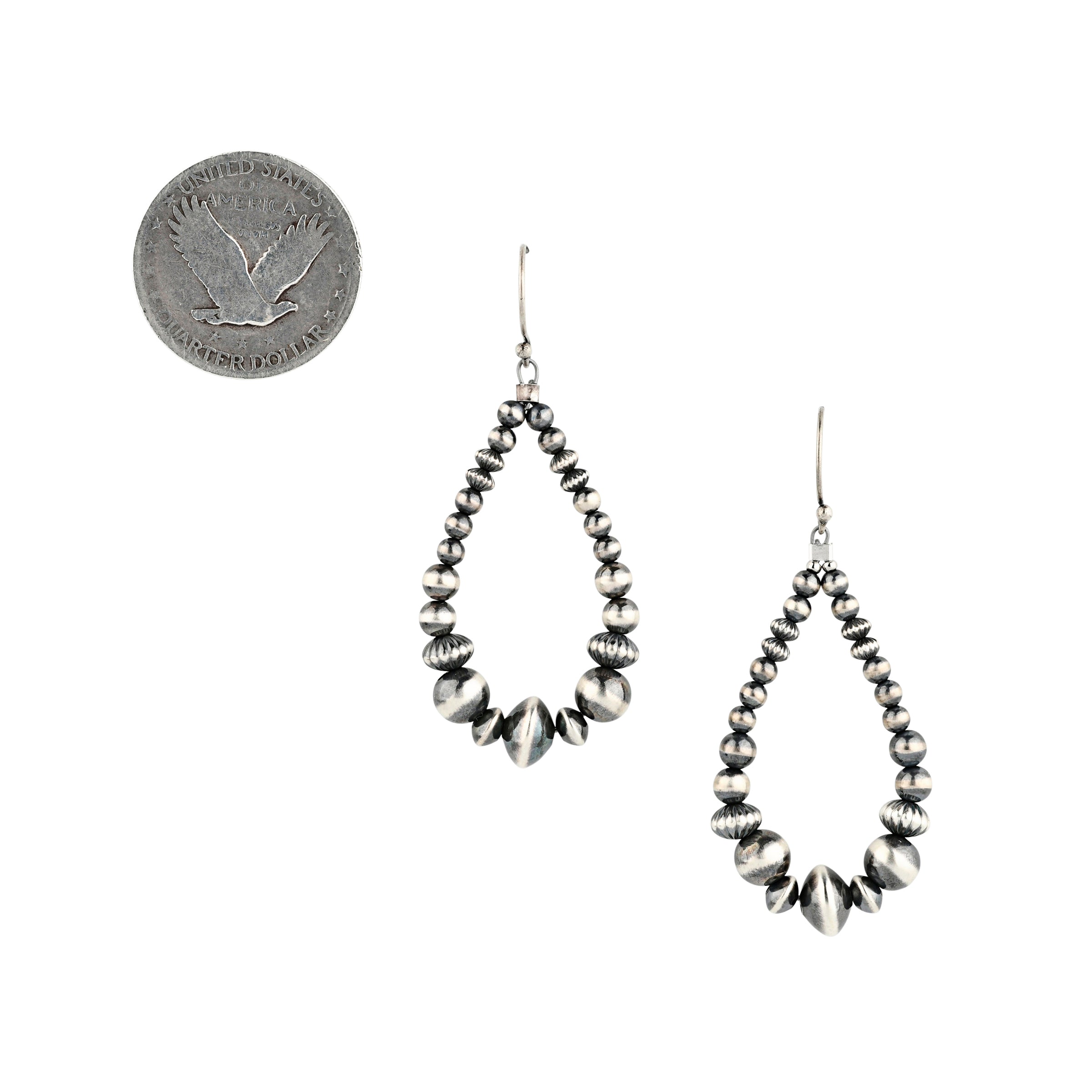 Assorted Desert Pearl Bead, hand strung hoop earrings next to coin for scale