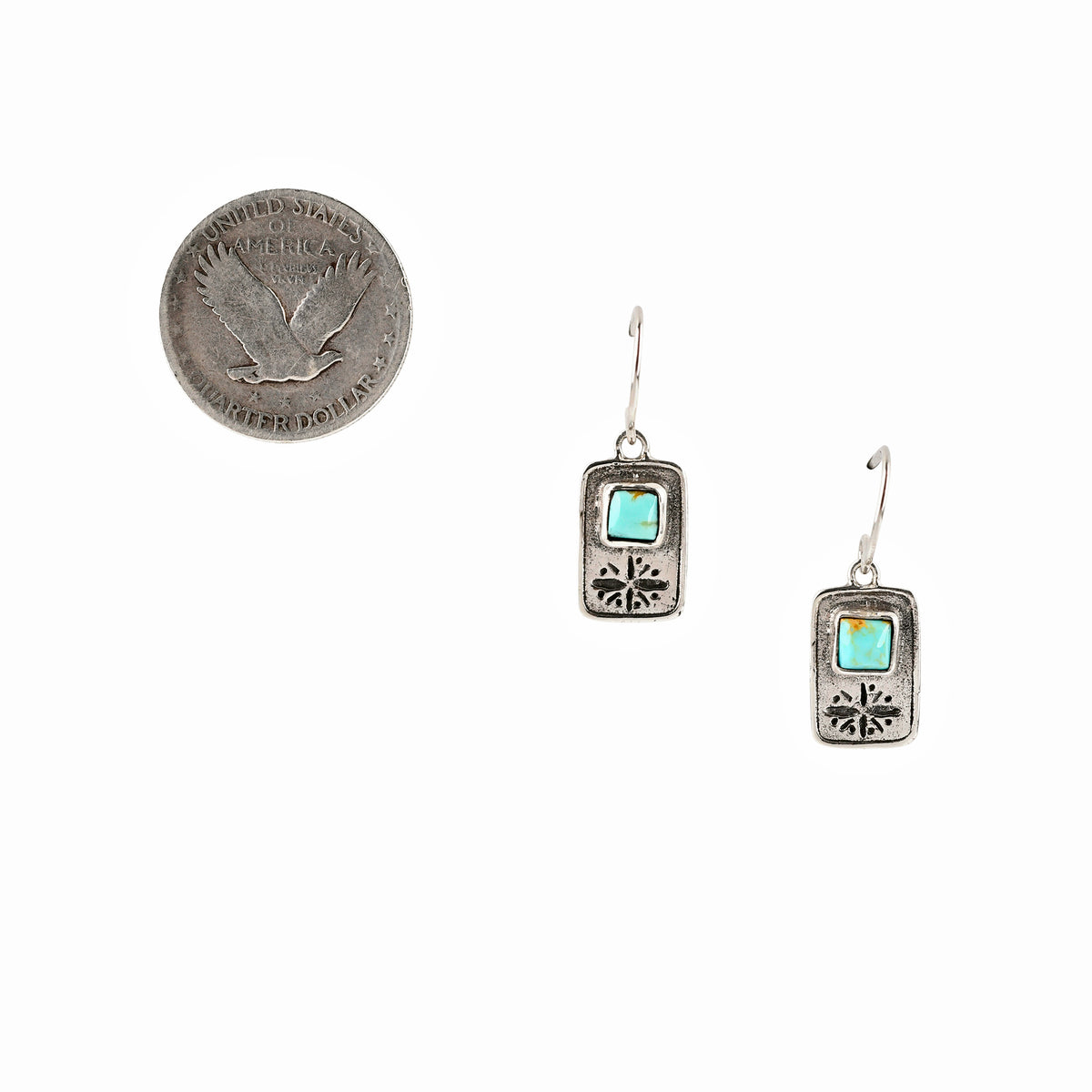 A pair of sterling silver rectangular drop earrings with a small square turquoise-blue inlay at the top and decorative stamping at the bottom.