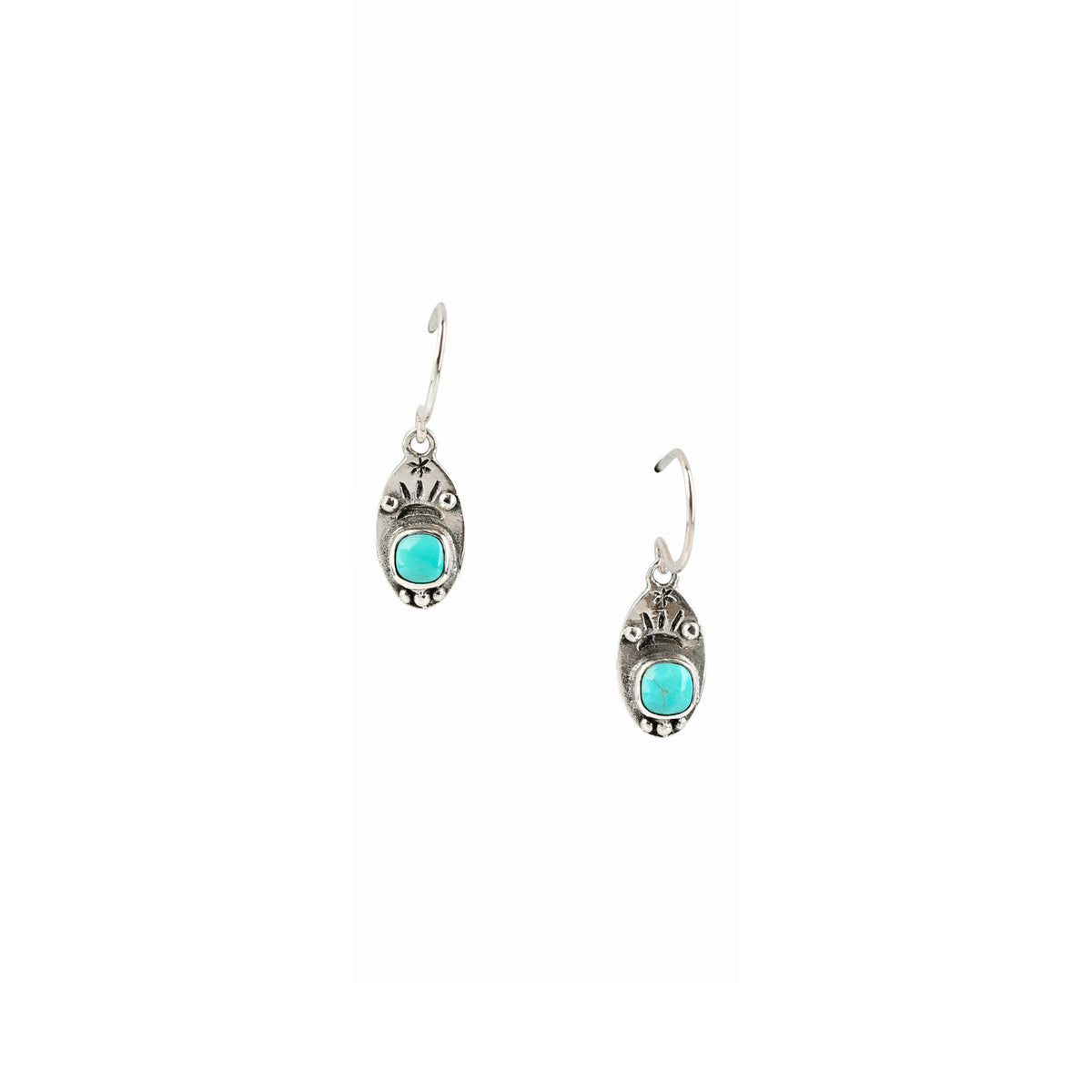 A pair of sterling silver dangle earrings with oval blue turquoise stone settings.