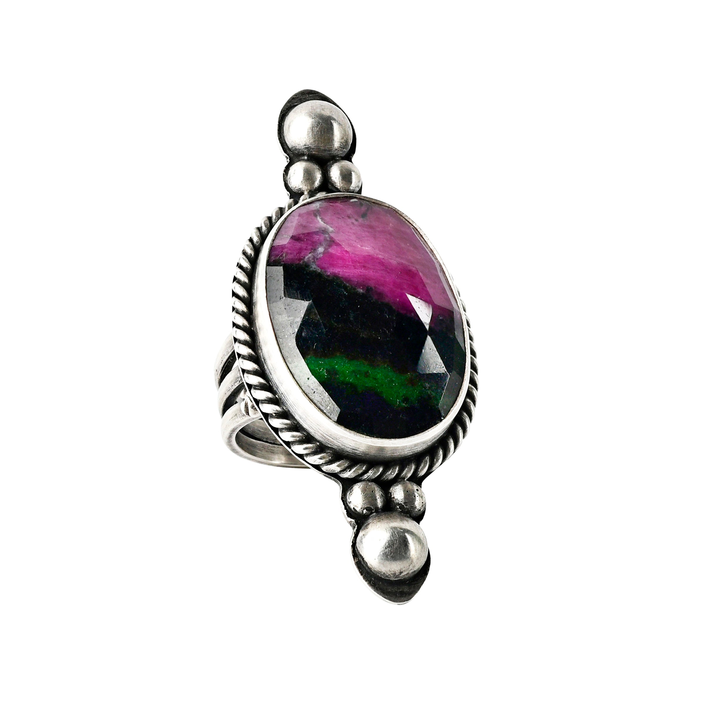 Pink, purple, green and dark green circular faceted cut stone set in sterling silver bezel with 3 silver balls on the top and bottom with rope detailing ring.