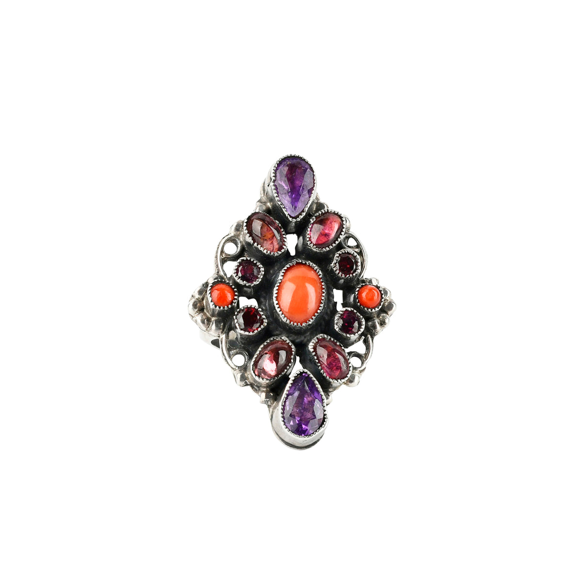 Sterling silver ring from artist Leo Feeney that features Red Coral, Amethyst, Pink Tourmaline, and Ruby stones.
