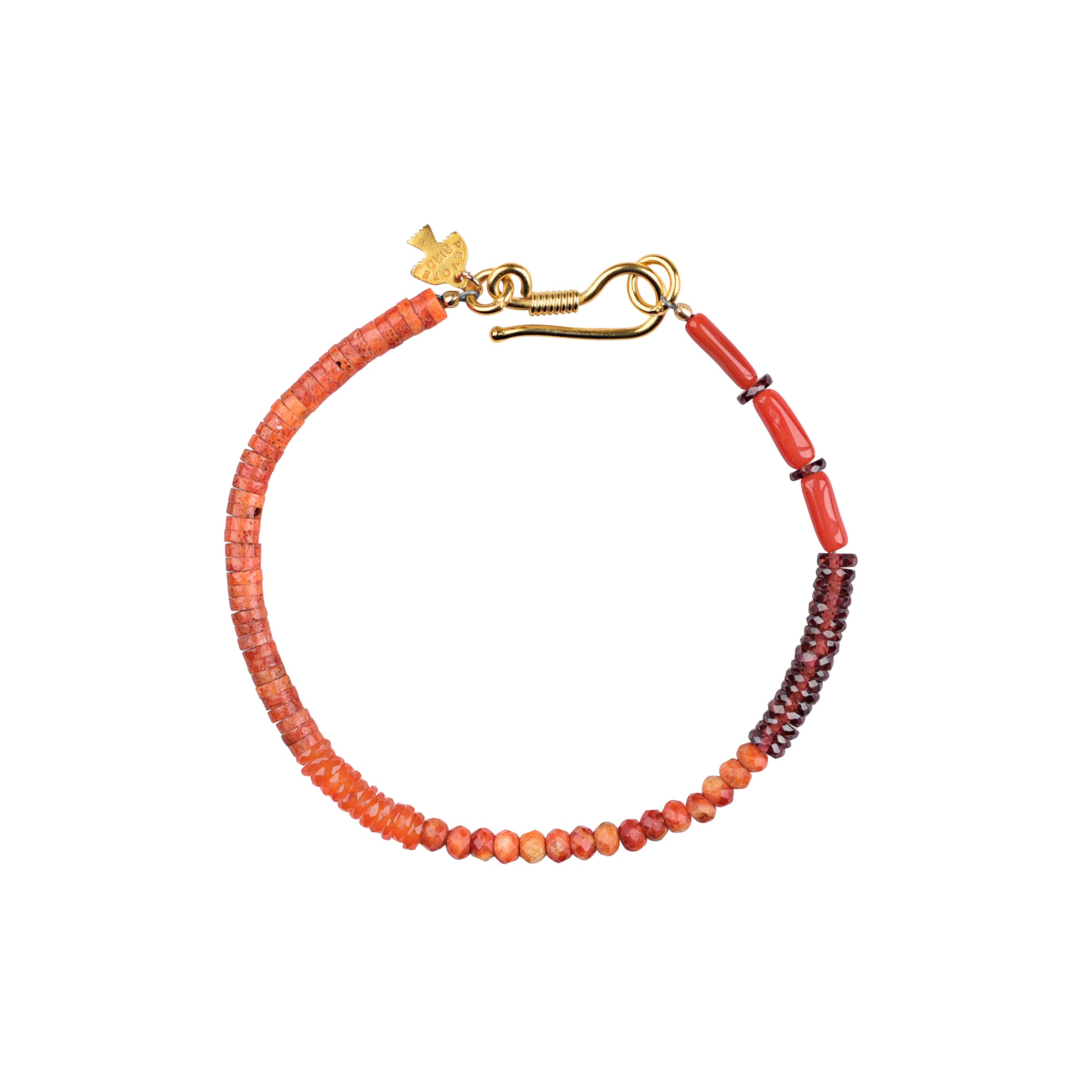 A bracelet with a 14K gold plate clasp and carnelian, garnet, red coral, orange coral, and orange sponge coral beads.