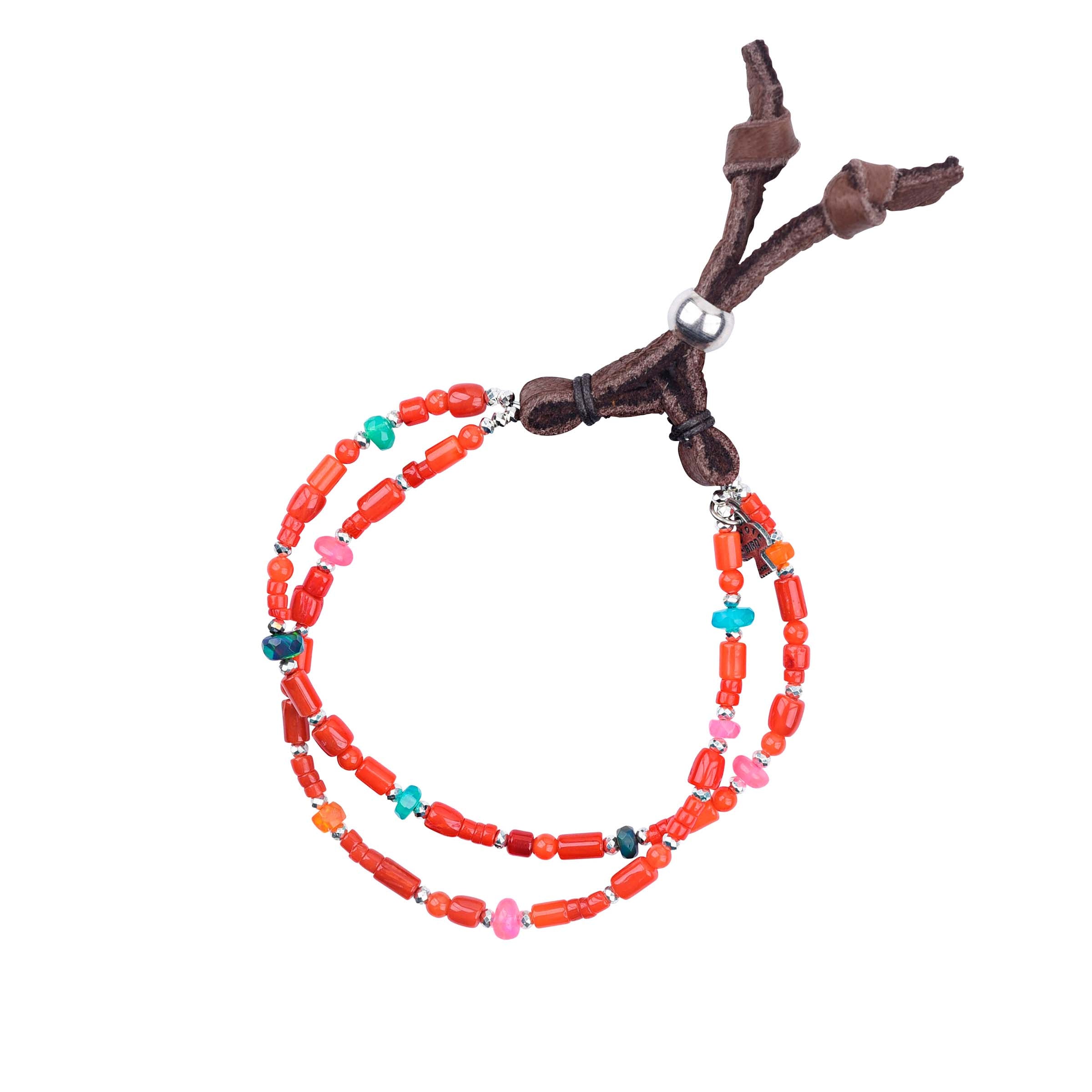 A multicolored beaded bracelet with leather ends, featuring Red Coral and Opal. Peyote Bird original. Made in USA.