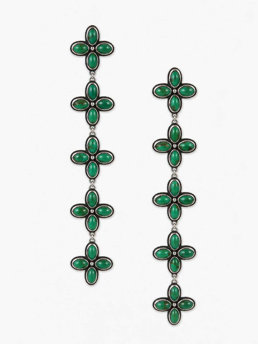 Long floral earrings with green stones by Dennis Hogan