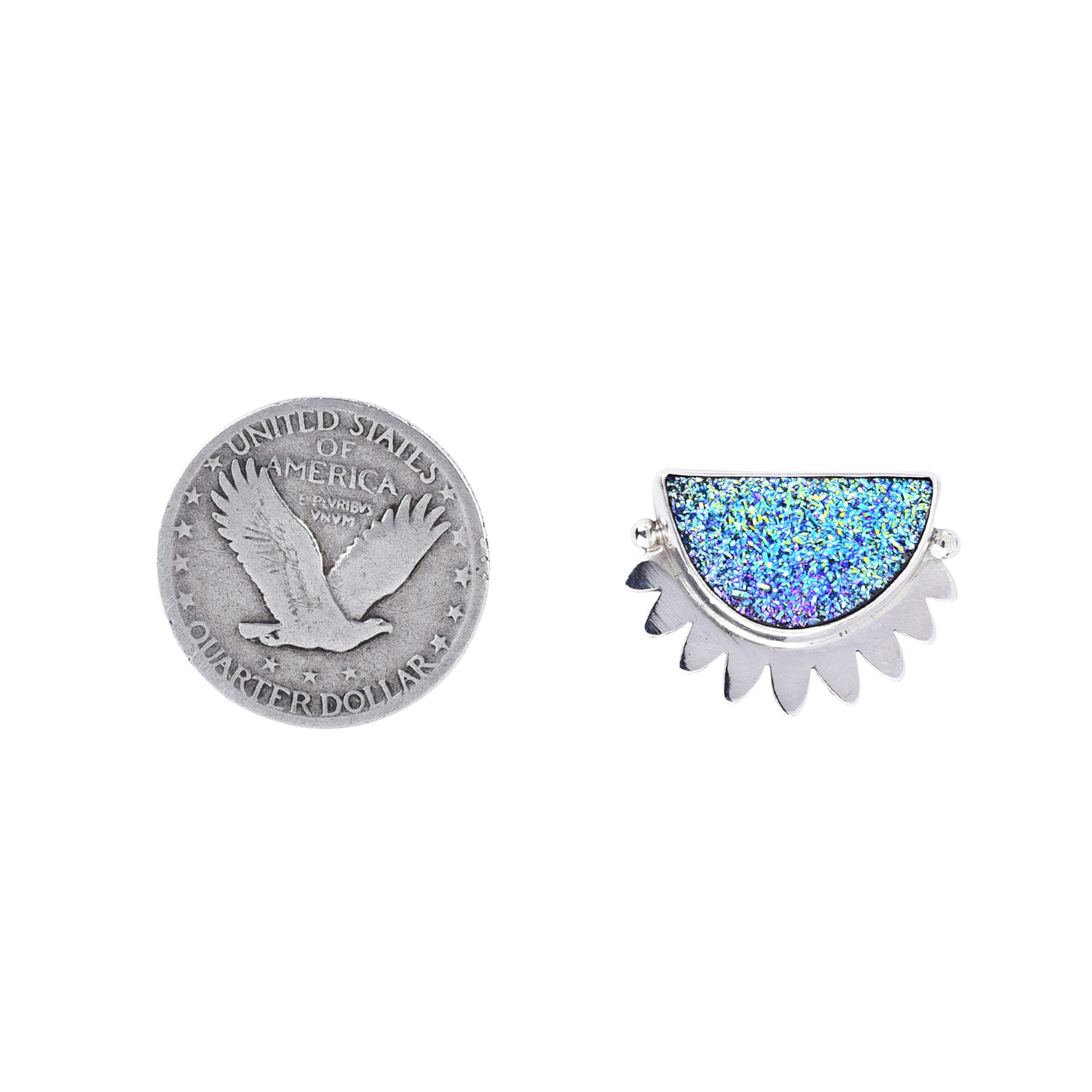 A pair of blue druzy earrings with a sparkling design, set in sterling silver.