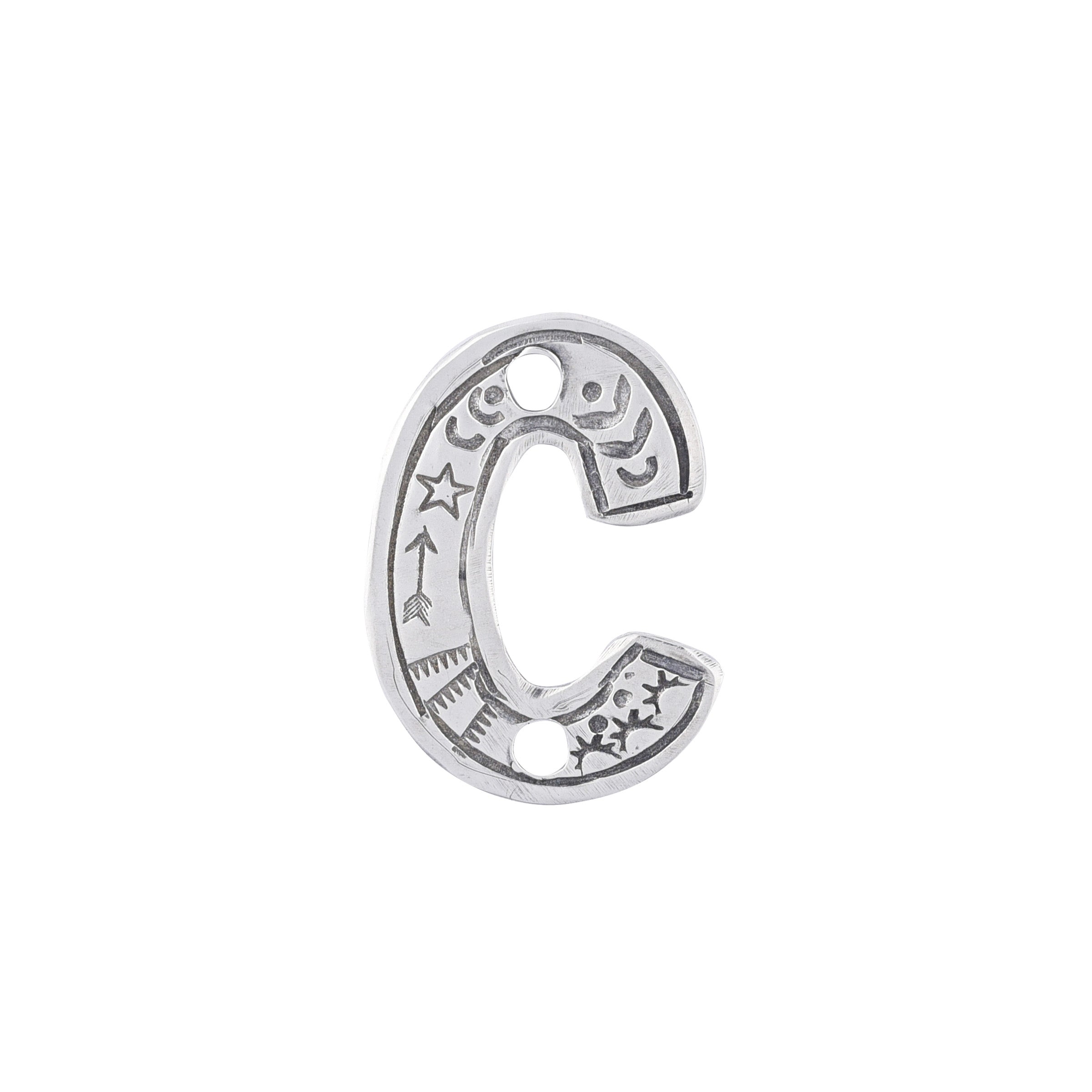 A sterling silver C Charm from artist Joe Eby that is a perfect addition to any hat or jacket.