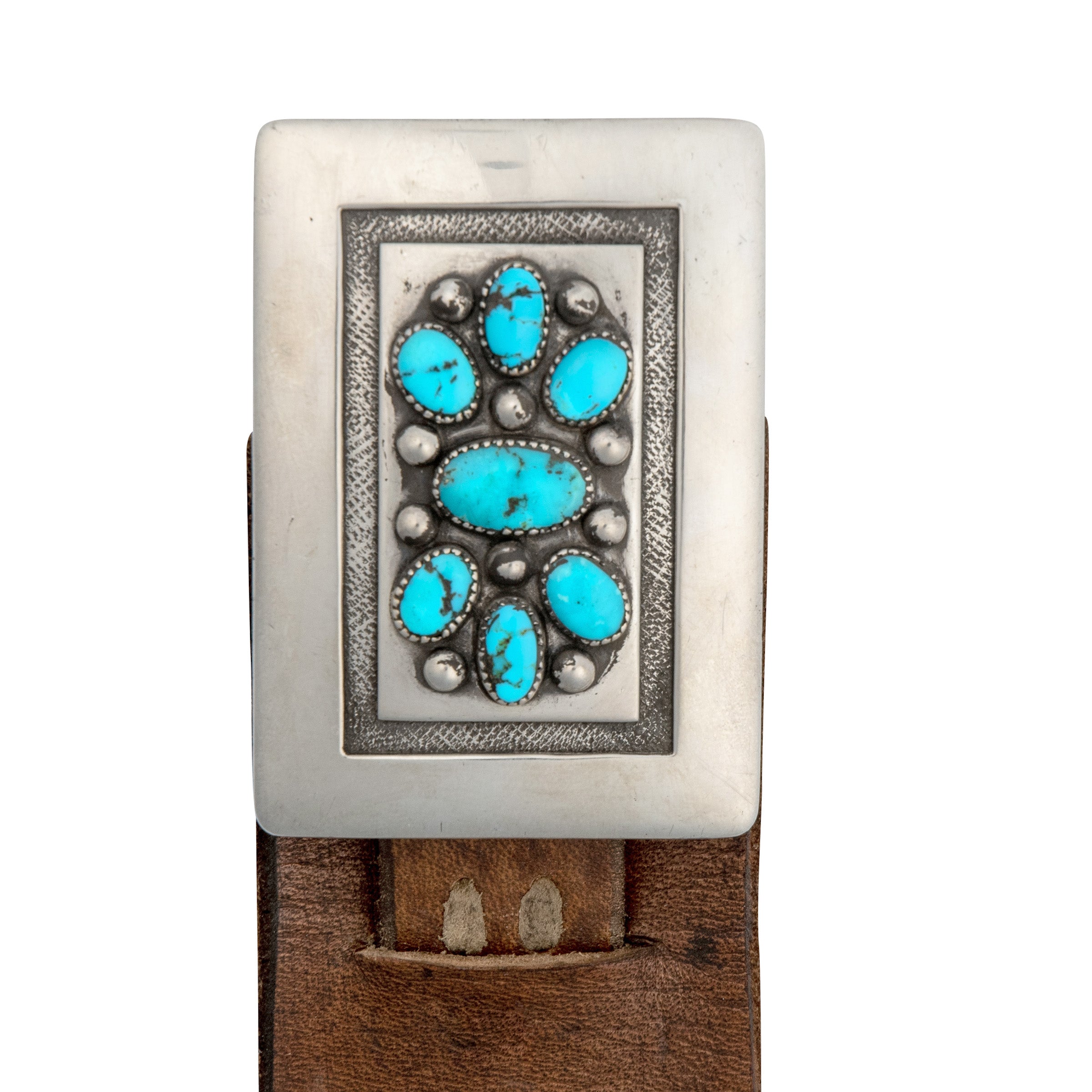 A vintage Frank Patania belt with rectangular silver conchos and a brown leather strap, featuring an ornate buckle with blue turquoise stones.