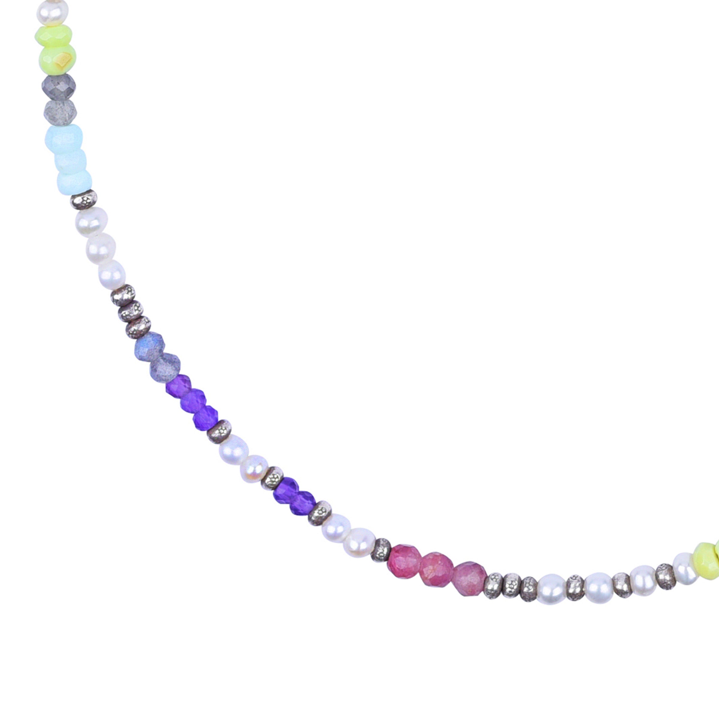 An adjustable Peyote Bird Original necklace featuring a variety of colorful beads including opal, pearl, and amethyst, with a length of approximately 16 inches. Made in USA.