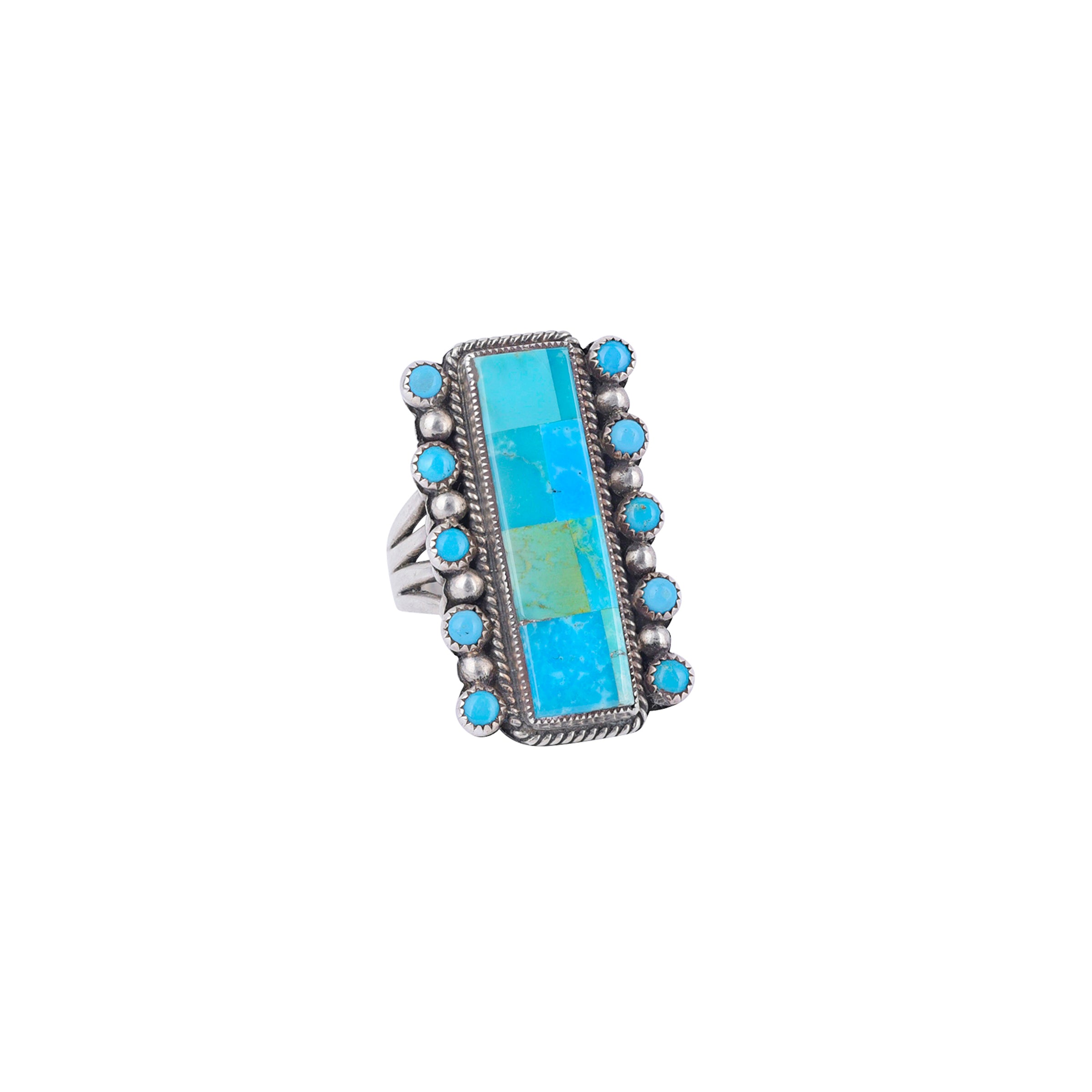 Indulge in the Aldrich Art Turquoise Garden Ring. Handcrafted by artisan Aldrich Art, this exquisite ring features stunning Blue & Green Turquoise.