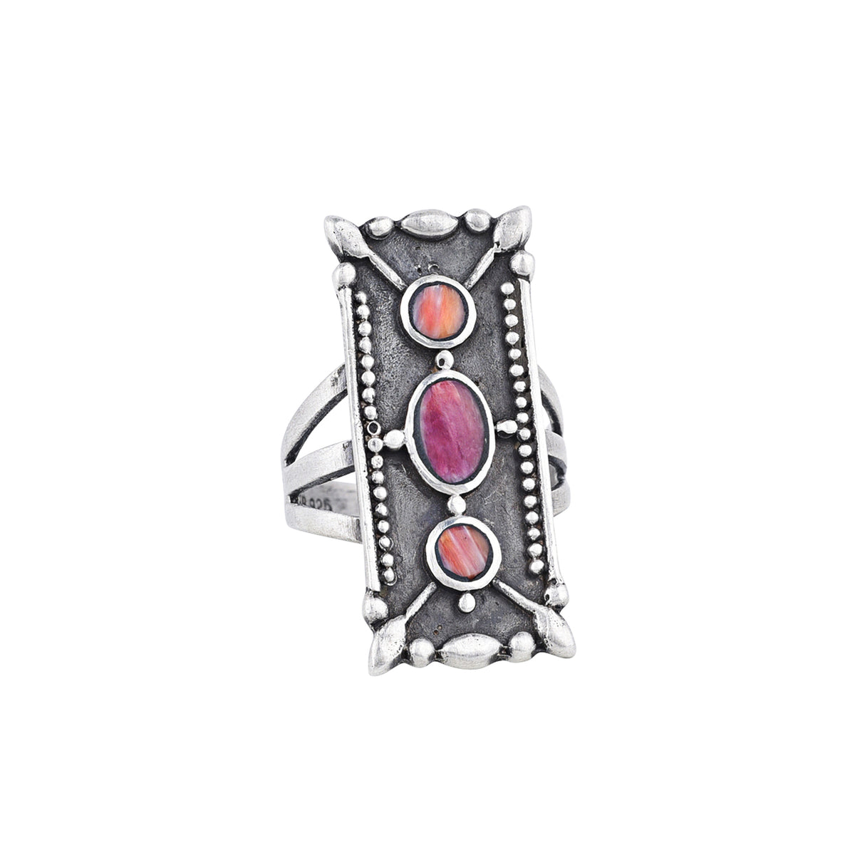 A rectangular sterling silver ring with orange and purple spiny oyster shell stones, featuring a textured design around the split shank band.