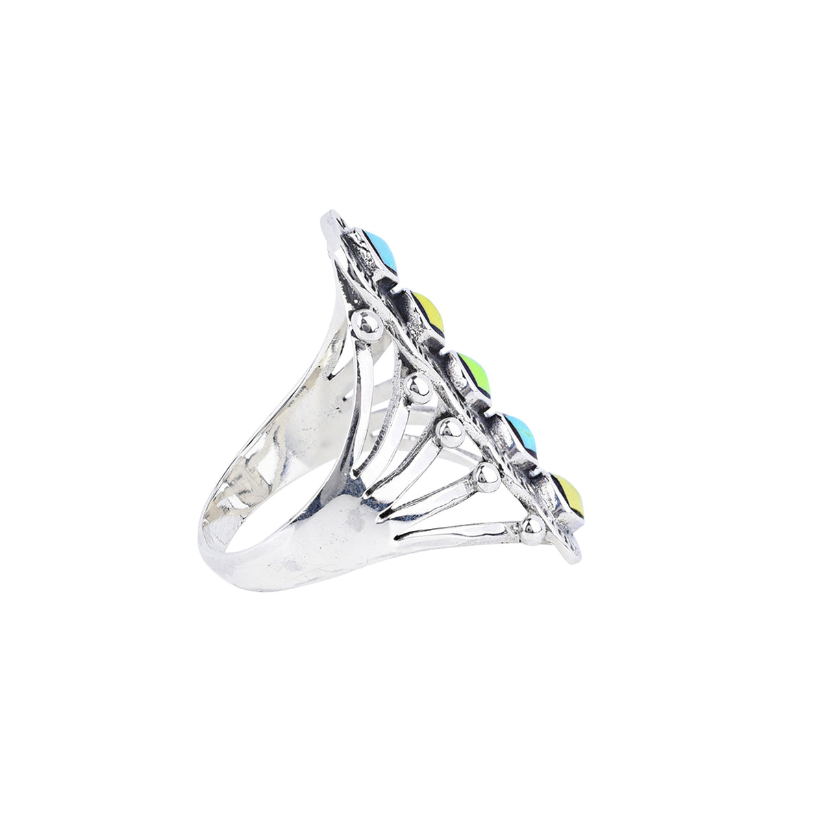 A sterling silver ring with blue and green turquoise stones in an artistic triangular pattern and a split shank band.