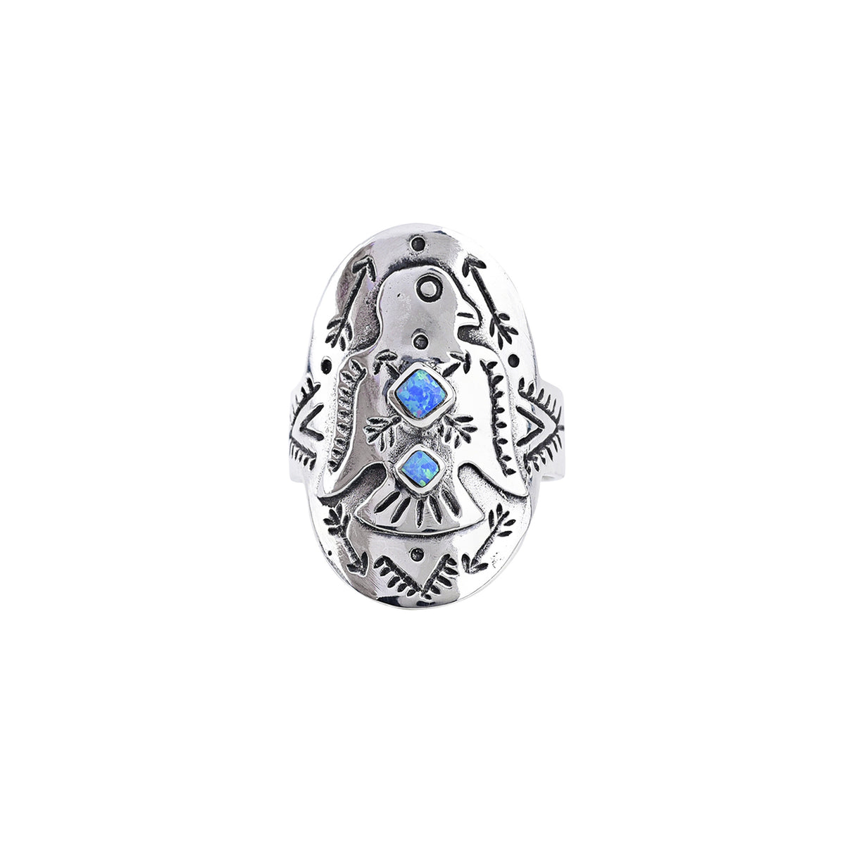 A sterling silver shield ring with a bird motif and Blue Opal stones as the centerpiece and intricate southwest stamped detailing.