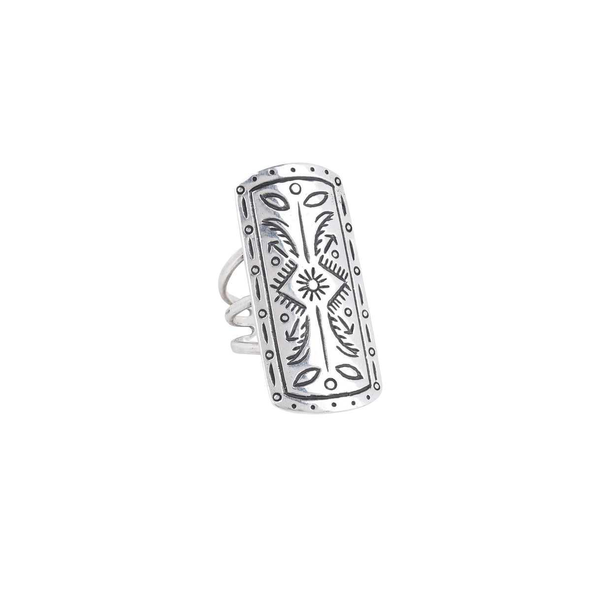 A sterling silver shield ring with intricate stamped arrows and a sun with geometric patterns and a split shank design.