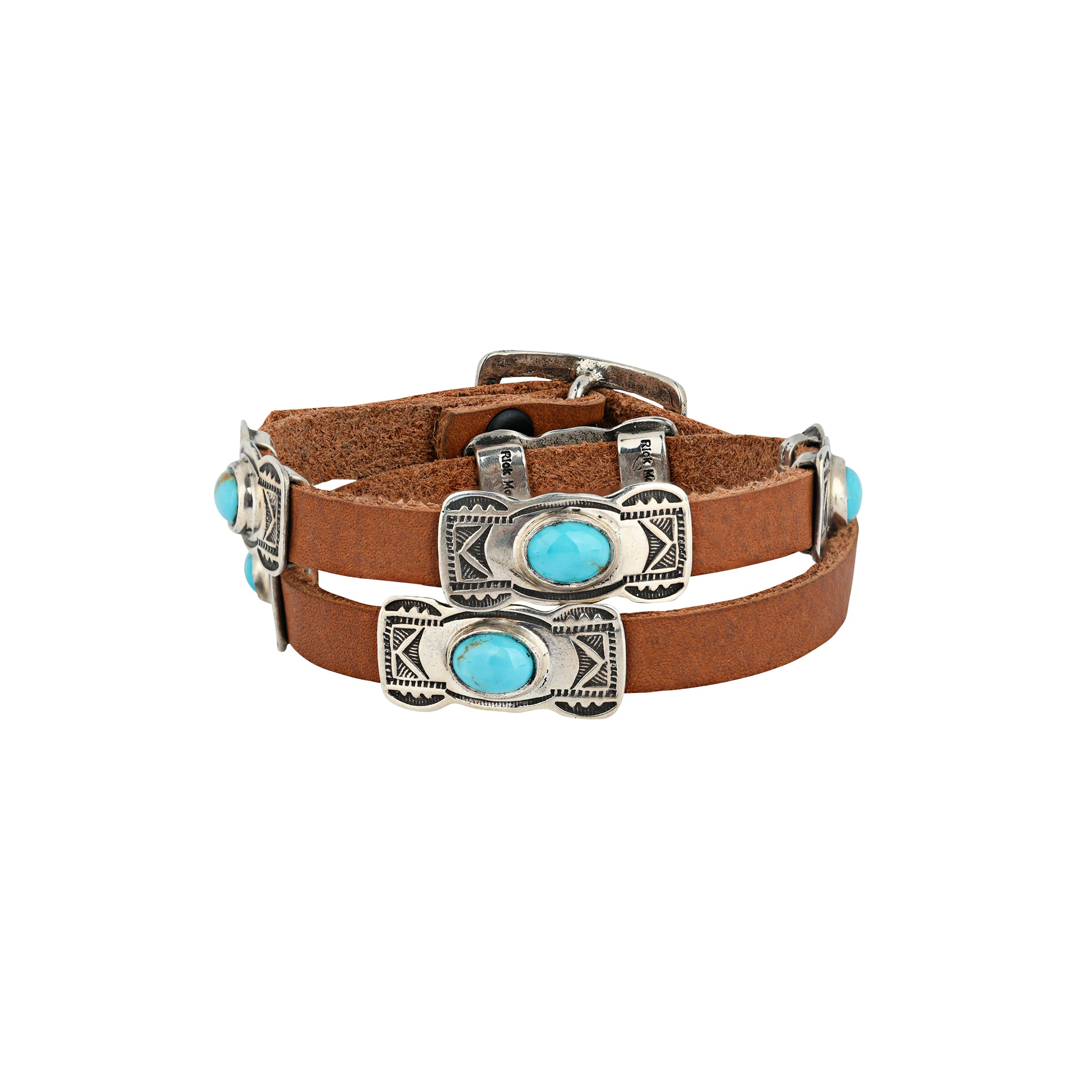 A handmade brown leather wrap bracelet featuring Southwestern stamped Sterling Silver conchos with Blue Turquoise