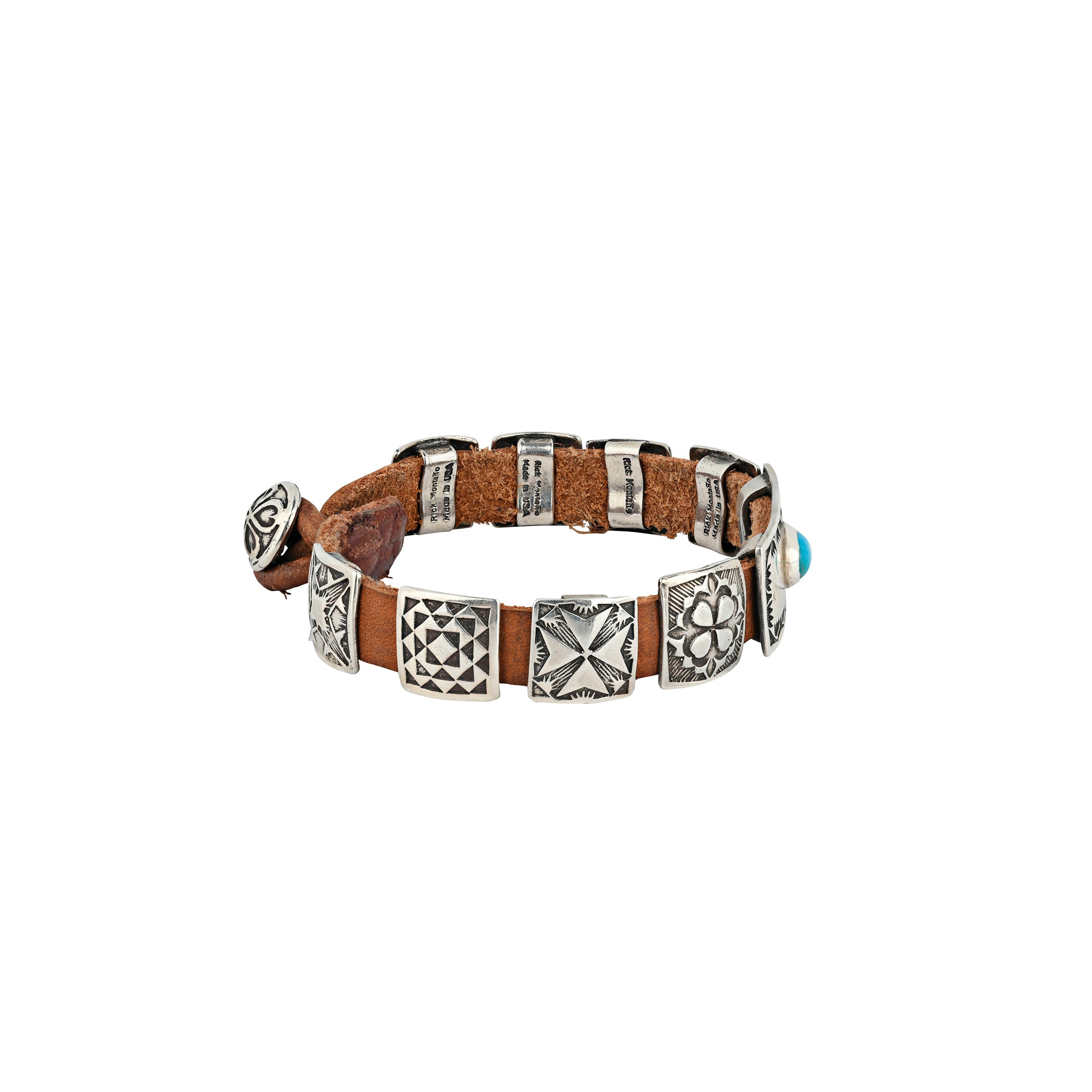 A handmade Southwestern style concho bracelet made with stamped Sterling Silver conchos on brown leather featuring Blue Turquoise