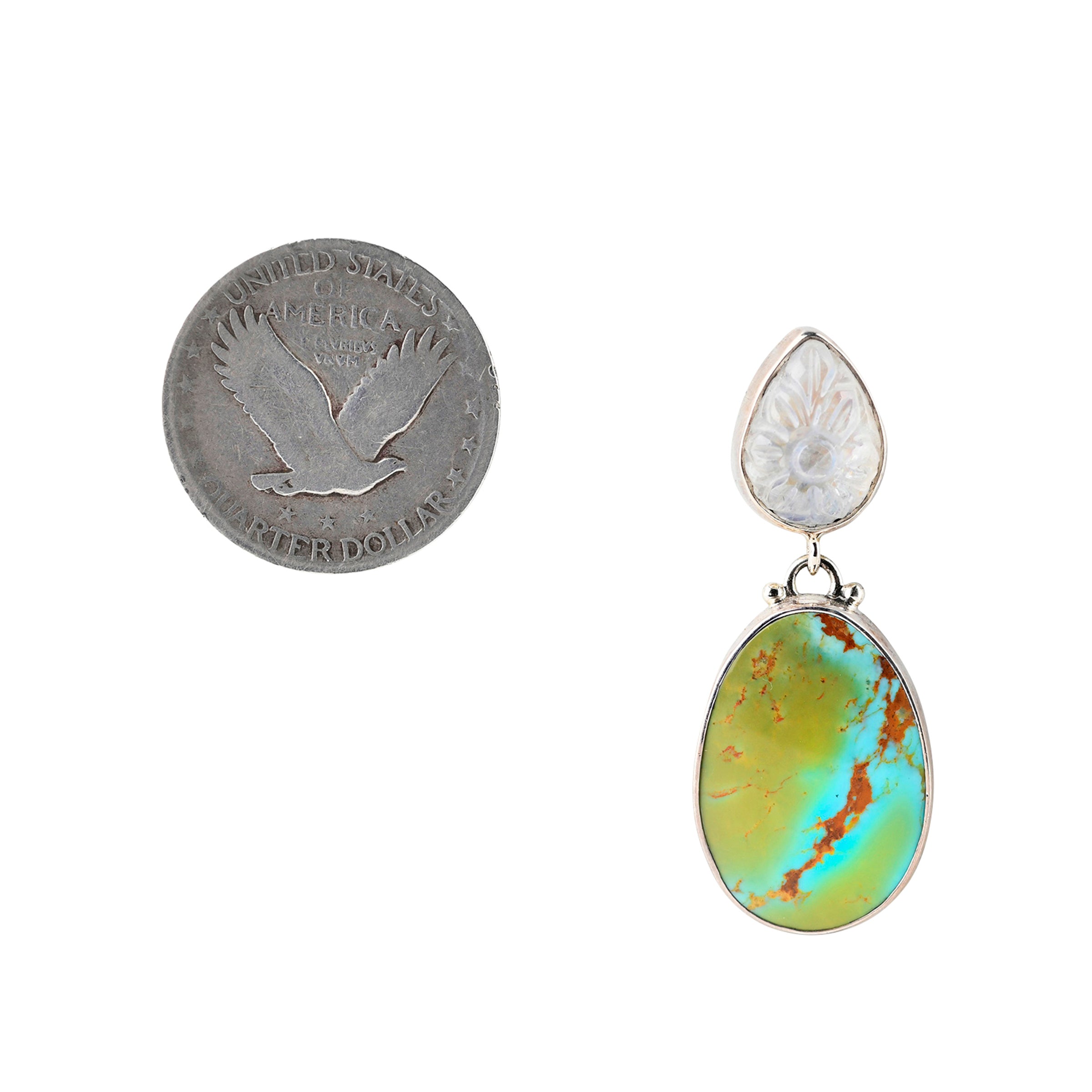 Turquoise and carved moonstone earring wrapped in sterling silver next to coin for scale.