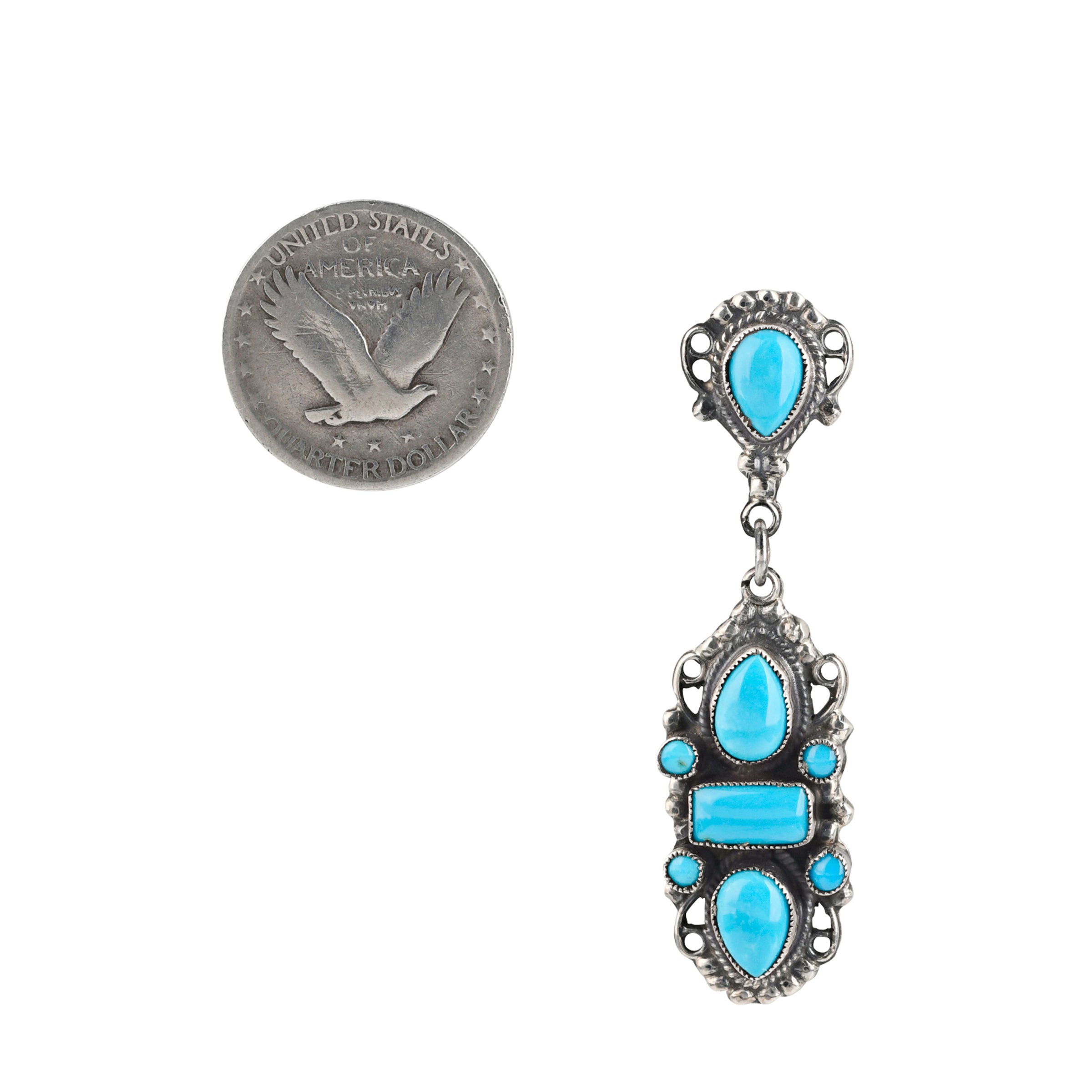 Beautifully handcrafted Sterling Silver Earrings adorned with Blue Turquoise and filigree embellishments