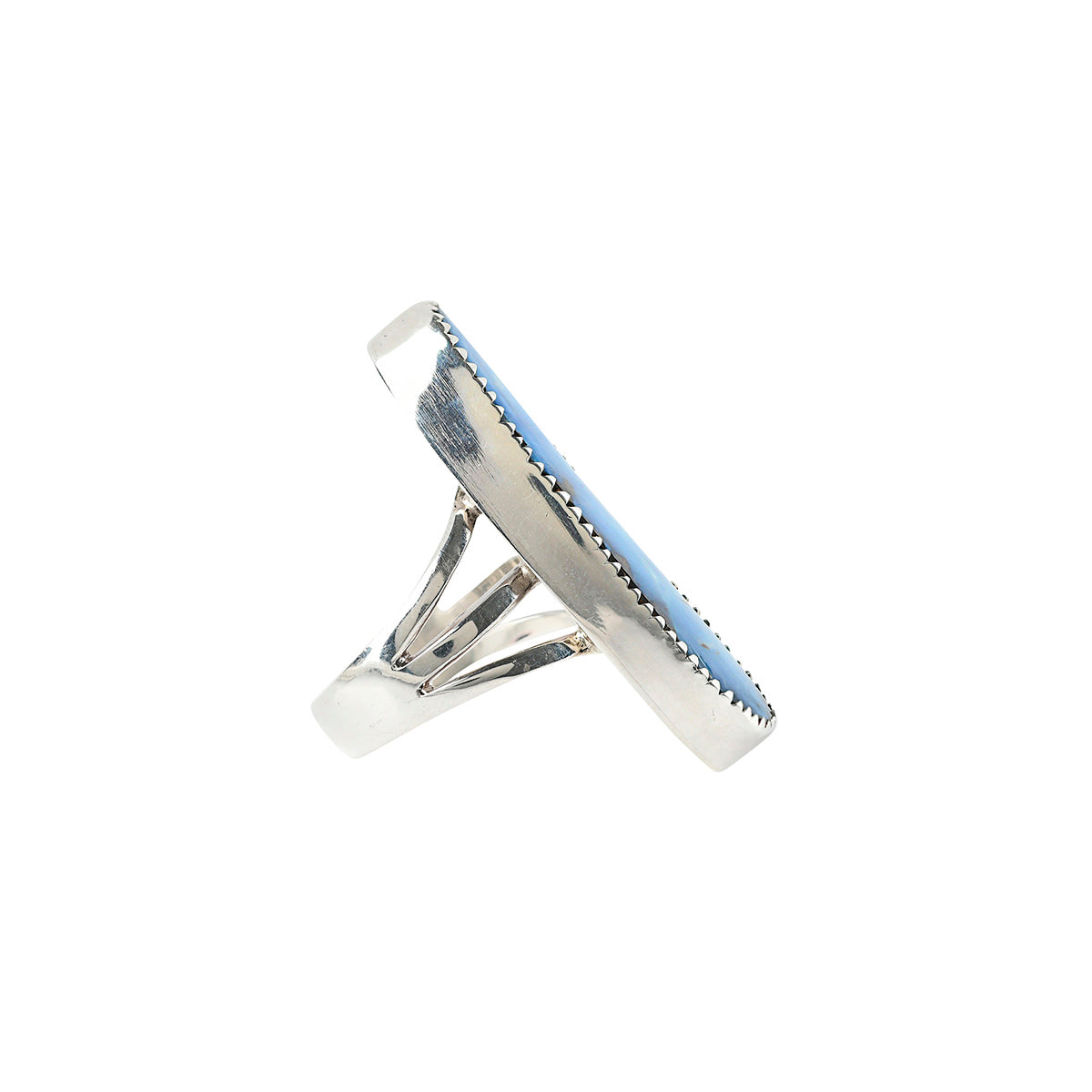 Sterling Silver and Opal Ring set with Sawtooth Bezel.
