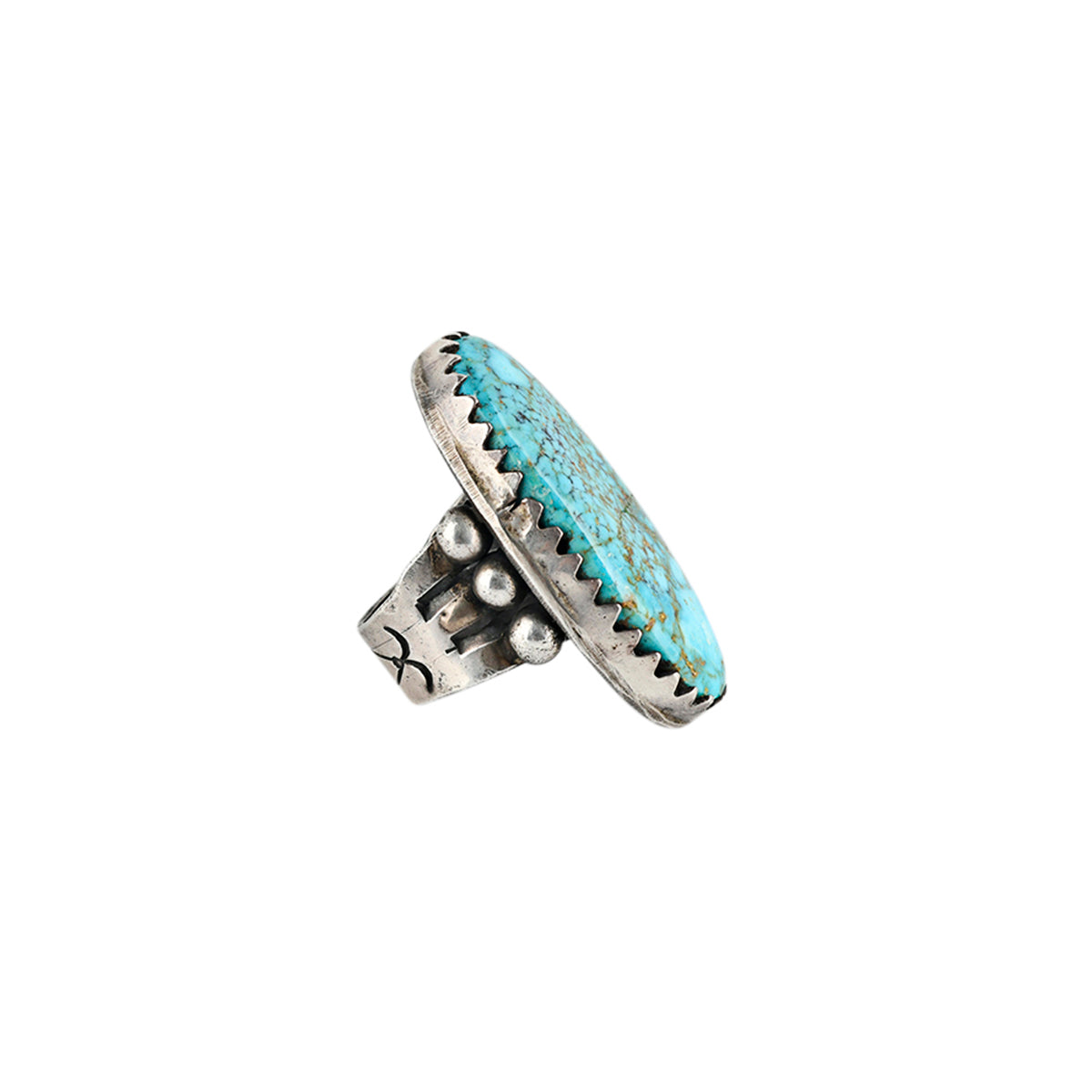 Turquoise stone ring with a stamped ingot coin silver band by Jock Favour