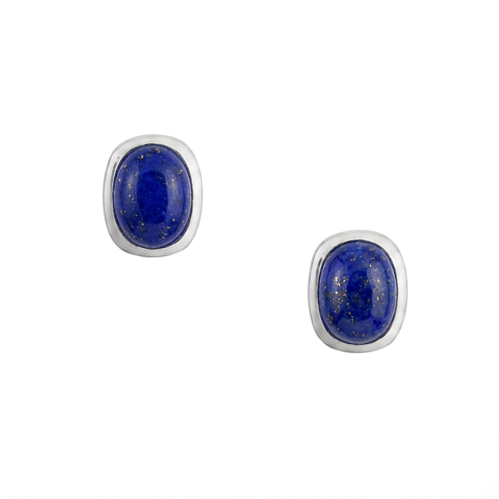 A pair of sterling silver stud earrings with rounded rectangular lapis cabochons and comfort earring backs.