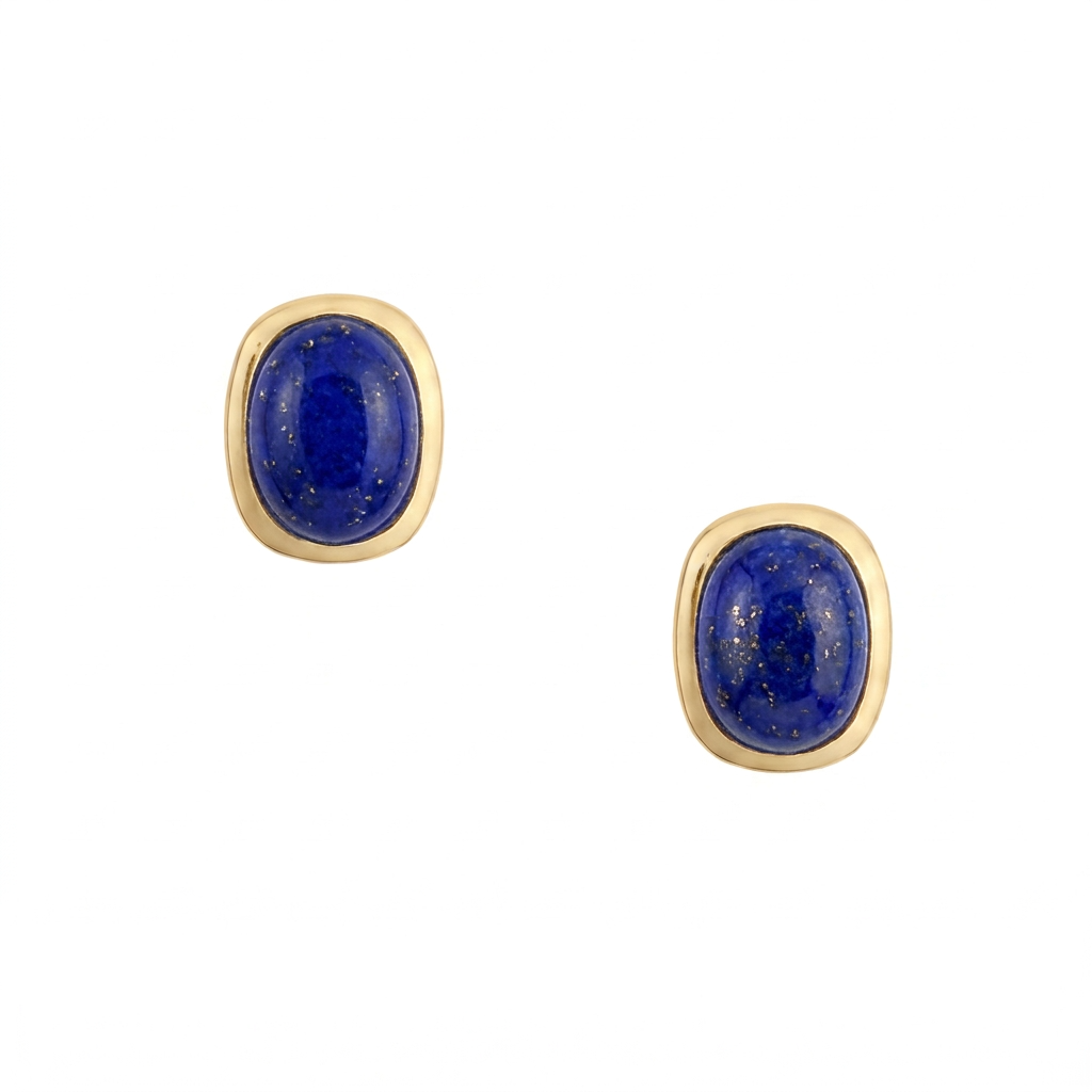 A pair of sterling silver and gold plated stud earrings with rounded rectangular lapis cabochons and comfort earring backs.