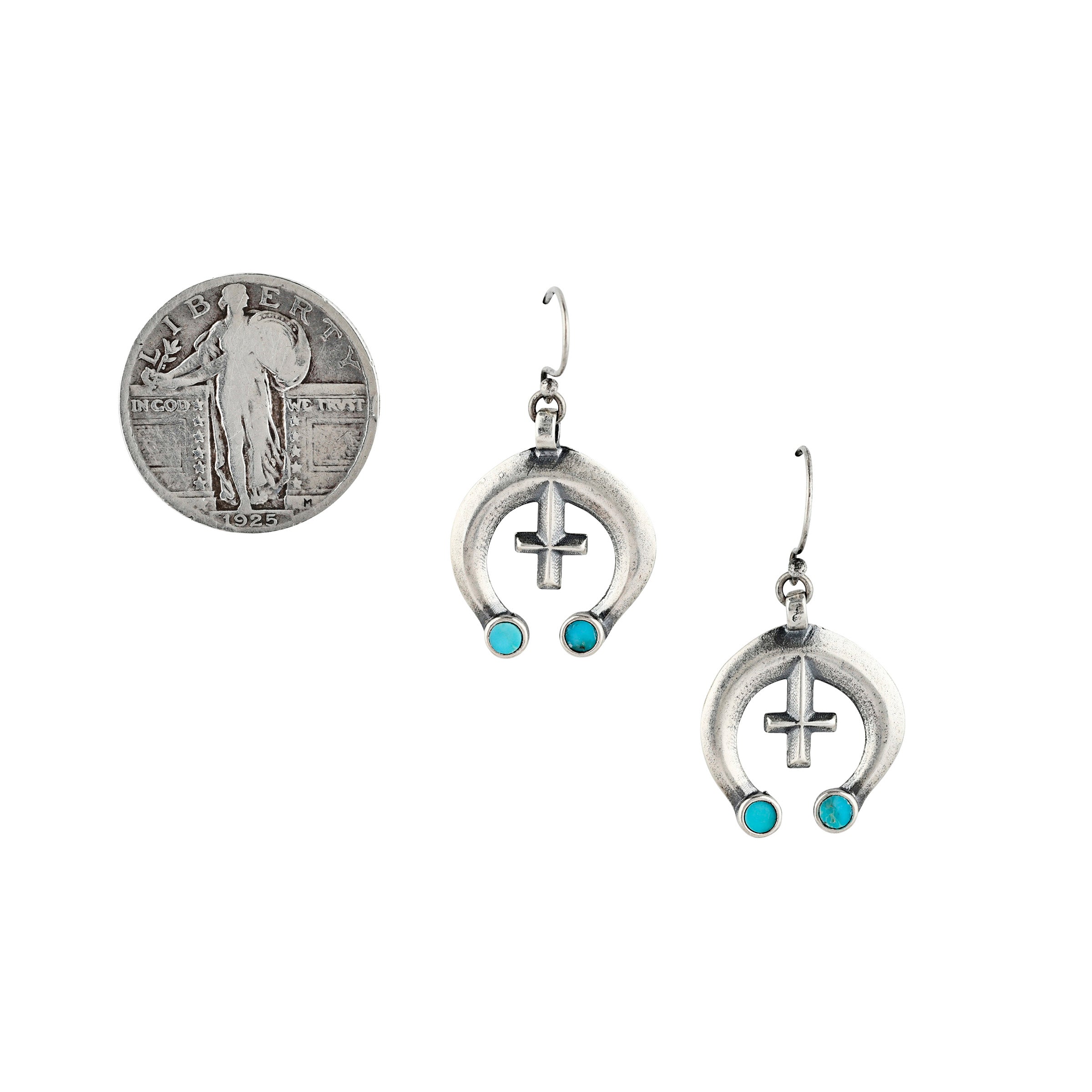 The Desert Trail earring is a southwest inspired naja design with sterling silver and turquoise