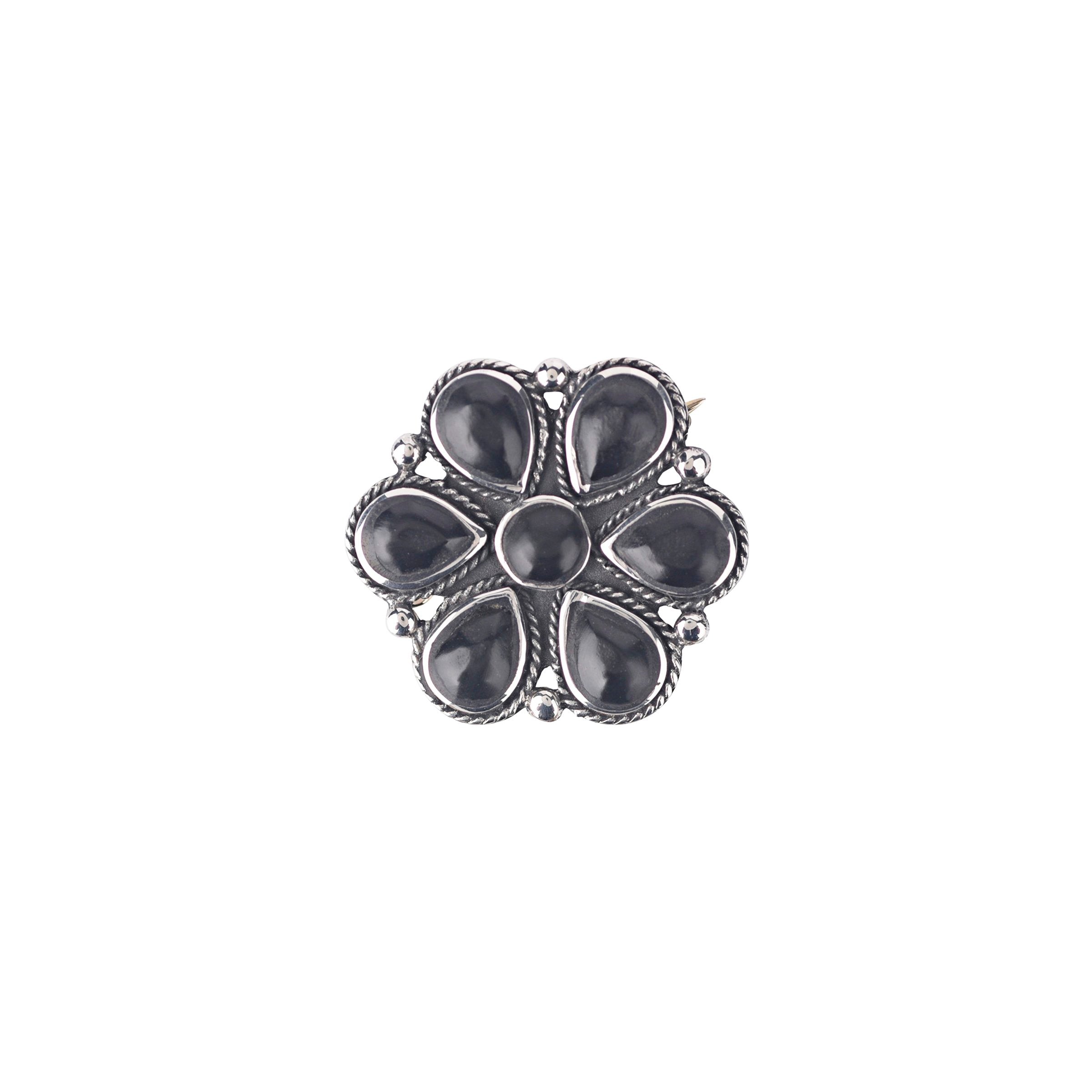 Flower Pin or Hat Tack made of Sterling Silver set with Onyx
