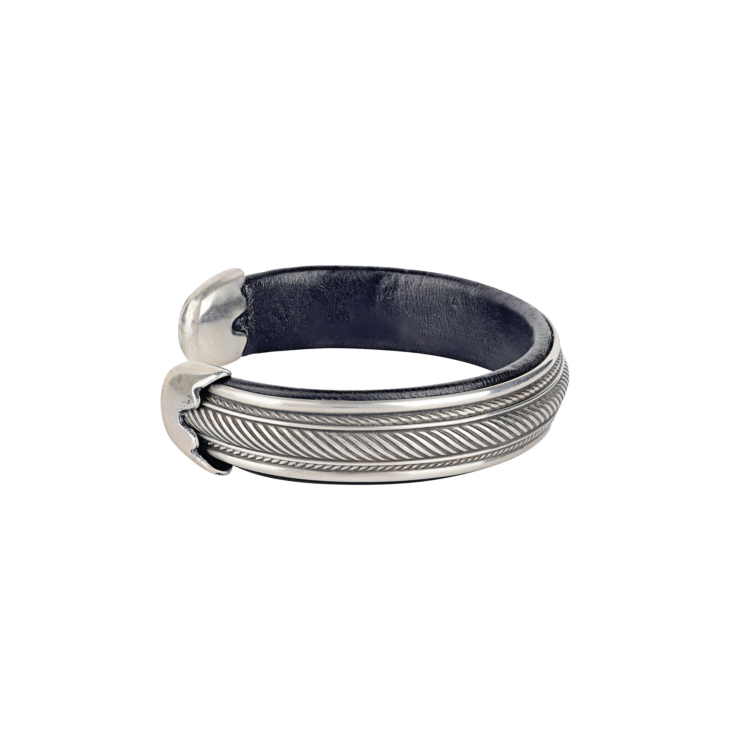 Comfortable brown or black leather and sterling silver cuff from artisan Ramona Heise. Adjustable and made in USA.