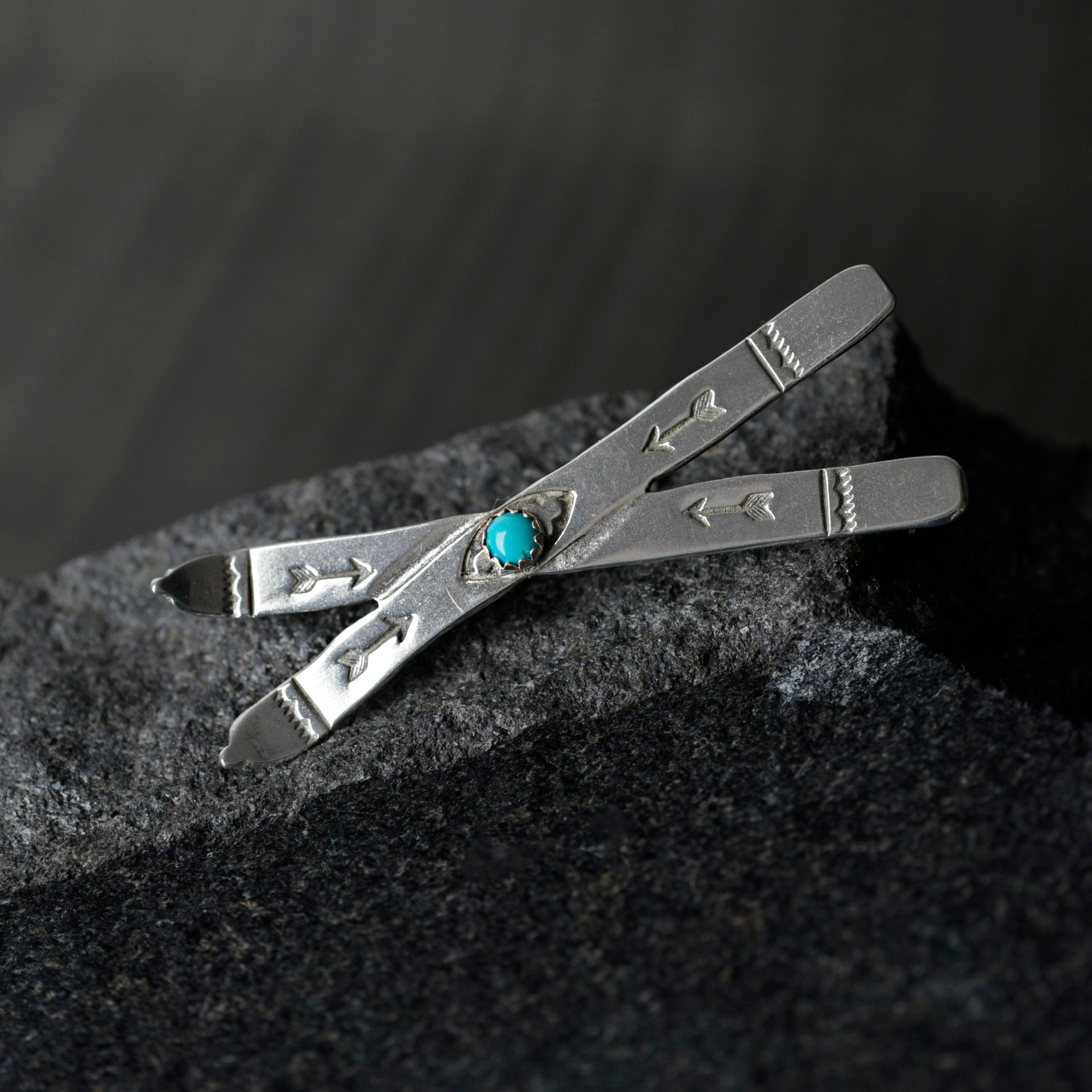 Joe Eby sterling silver skis pin with blue turquoise stone.