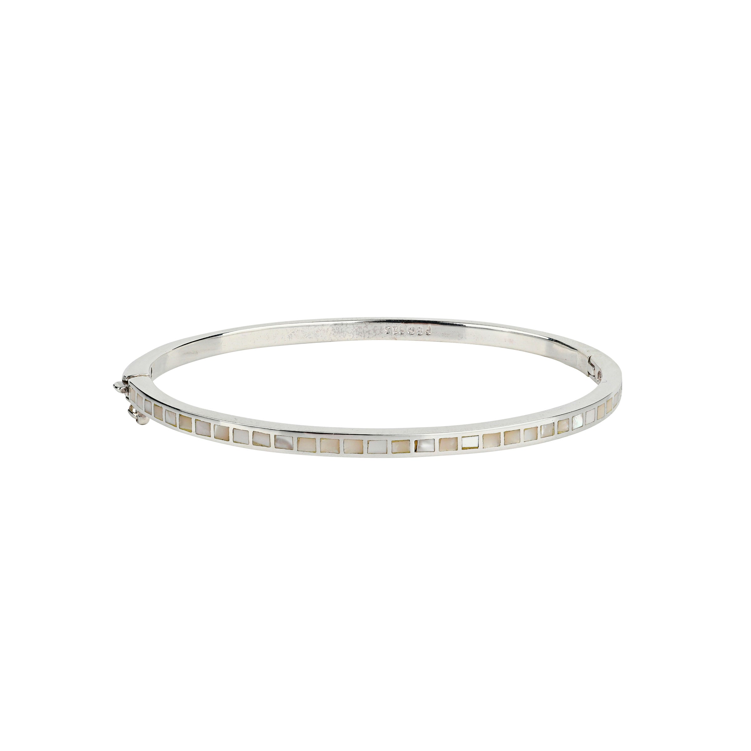The Element Bangle is sterling silver inlayed with semi-precious stone of mother of pearl