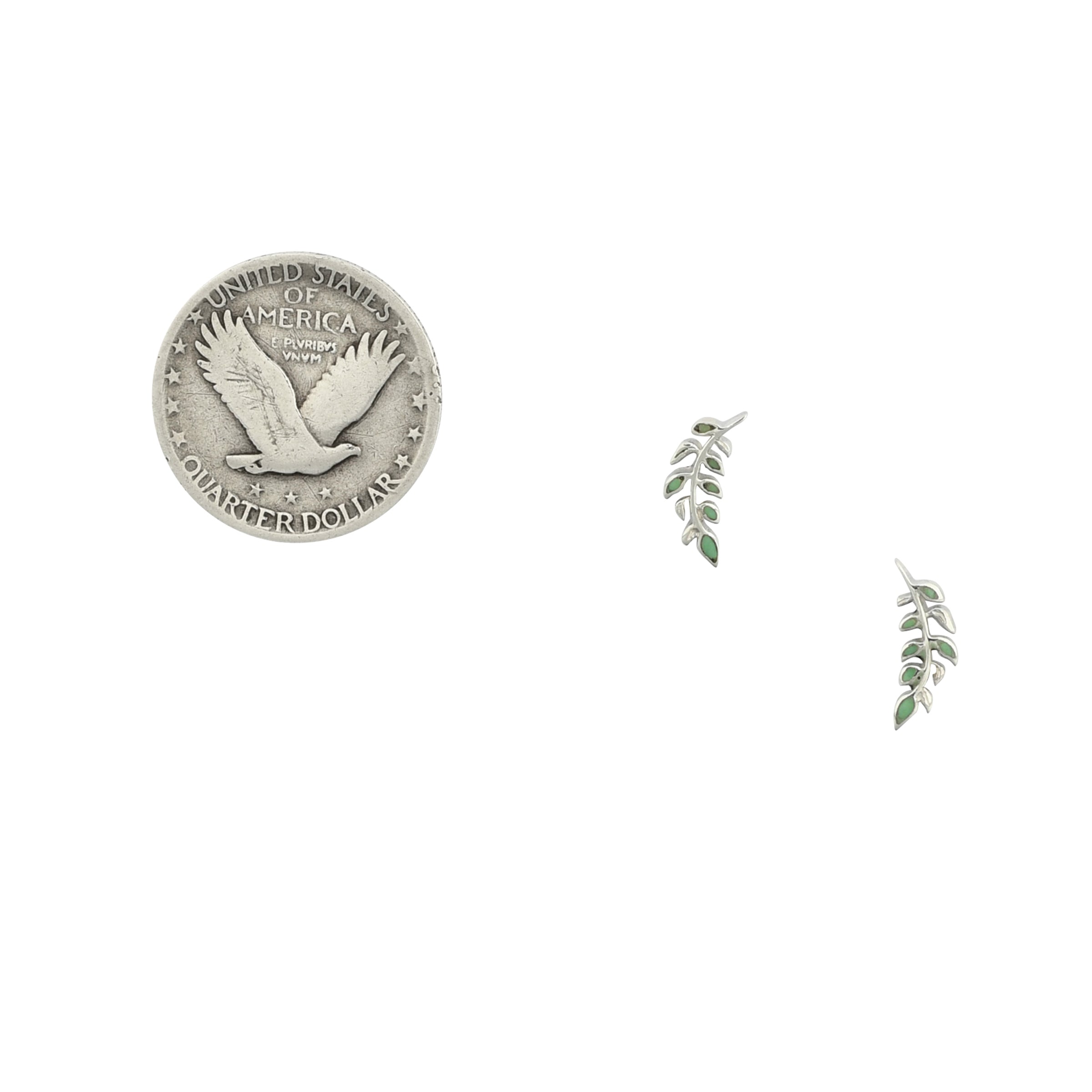 Sterling silver green turquoise inlay earrings in leaf motif next to coin for scale. 