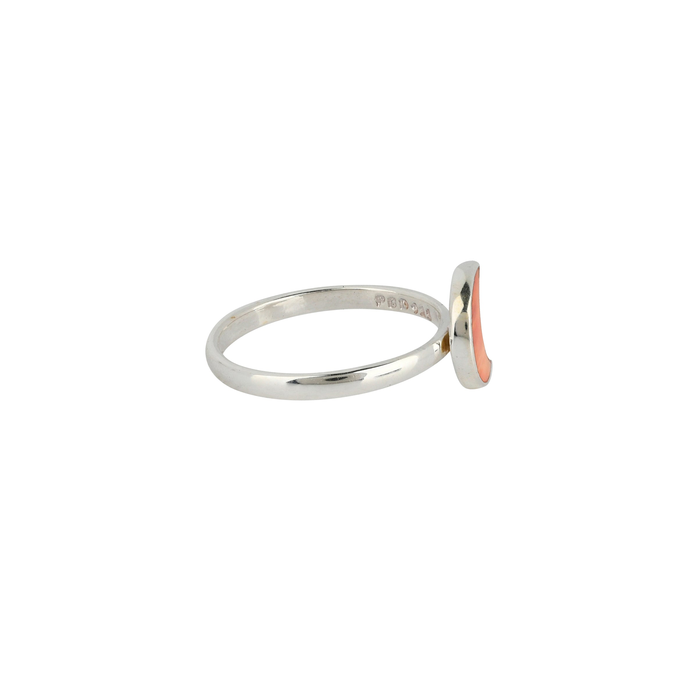 Sterling Silver band ring with crescent shaped moon design in Orange Spiny Oyster Shell stone side view. 