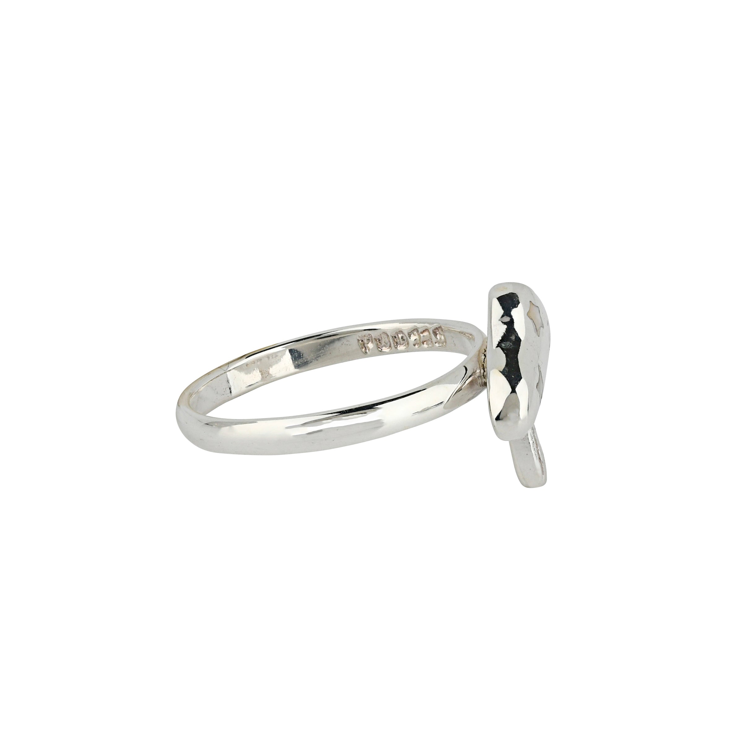 Sterling Silver ring with mushroom design and small circular Mother of Pearl stone inlay side view.