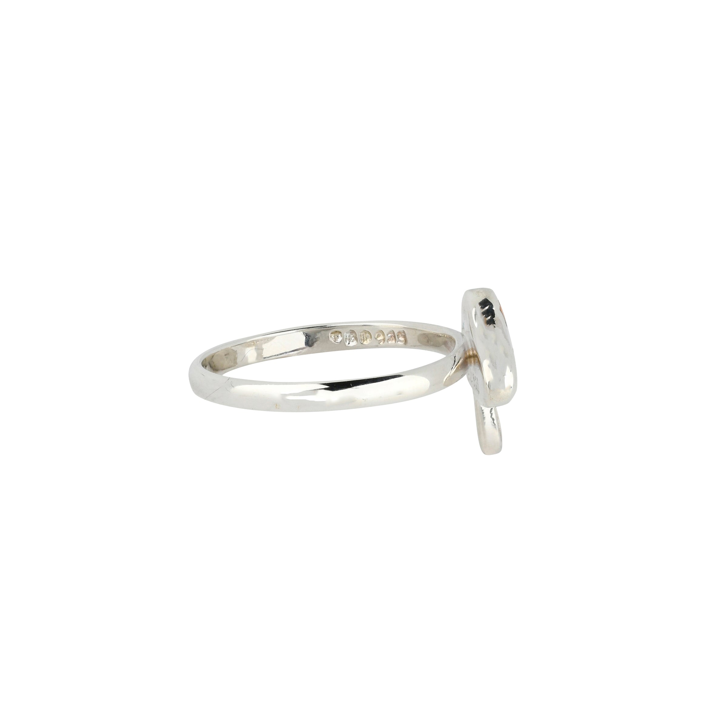 Sterling Silver ring with mushroom design and small circular stone inlay side view.