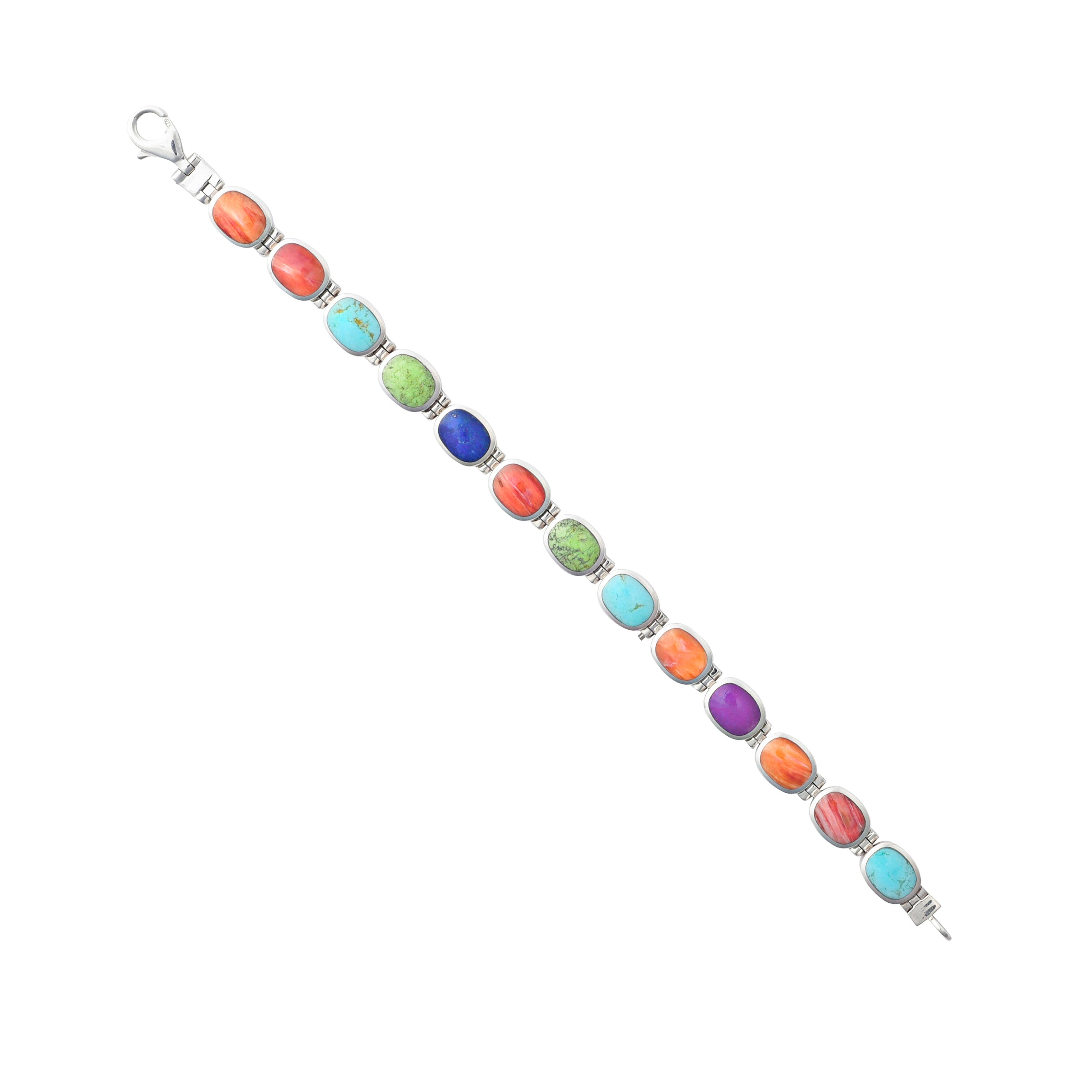 The Santa Fe link bracelet from the Bird and Arrow collection features sterling silver and beautiful onyx stones on one side and blue turquoise, gaspeite, lapis, and spiny oyster shell on the other side.