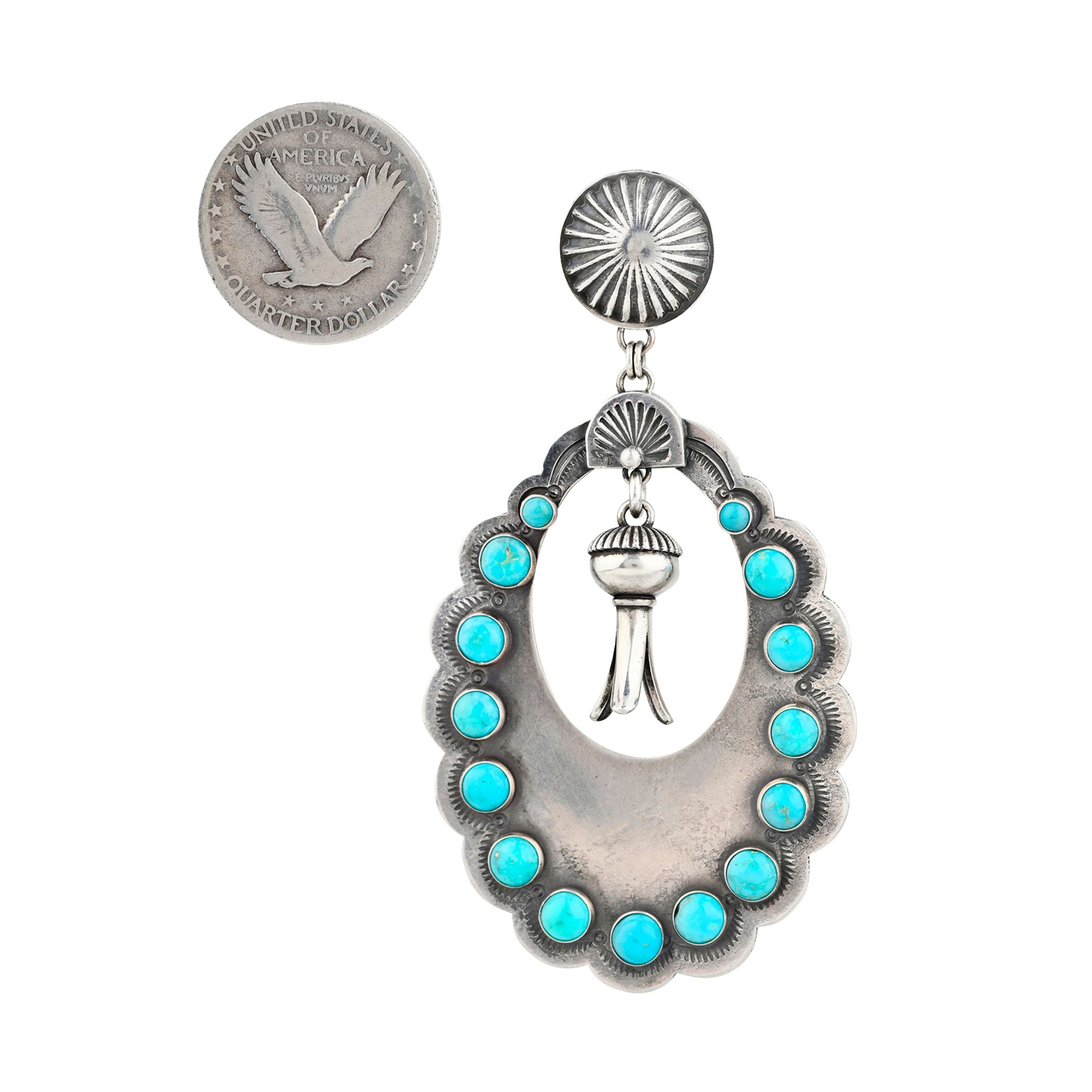 Sterling silver concho post and dangle earrings from American artisan Dennis Hogan. Featuring turquoise and coral stones and squash blossom center piece. 