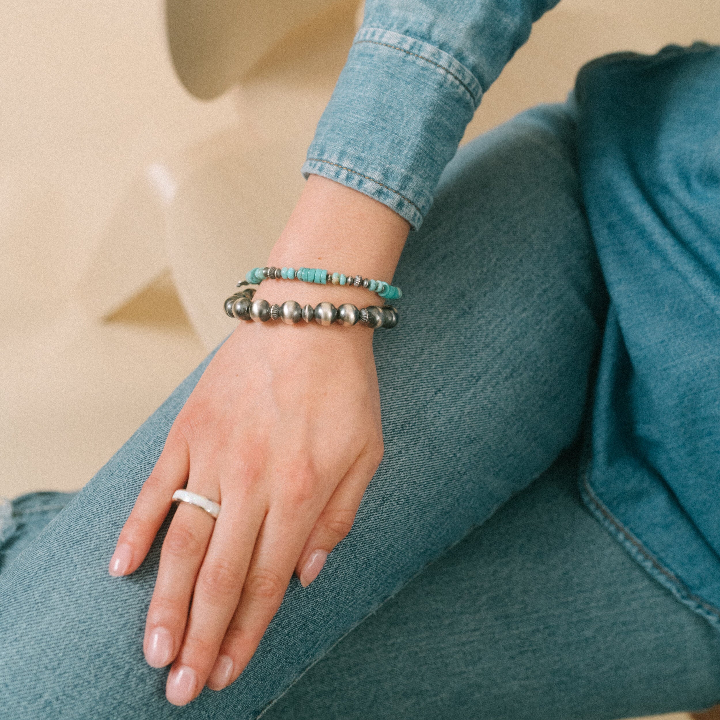 Sterling silver beaded stretch bracelet in a variety of different bead sizes, styles, and combinations. 