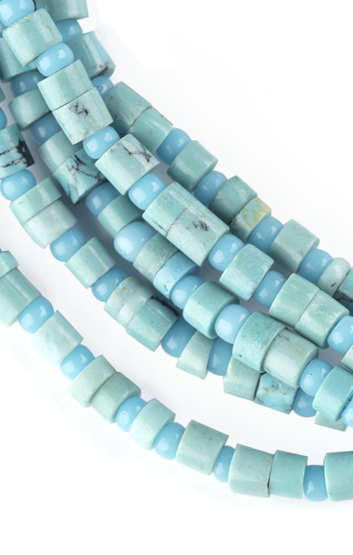 detail of heishi turquoise multi strand bracelet with seed beads 
