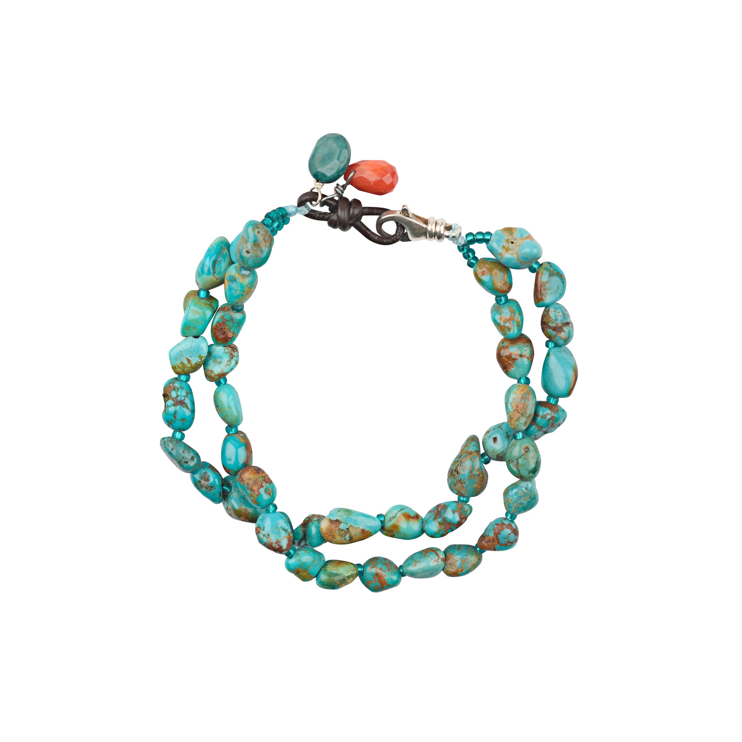 Turquoise two strand bracelet with sterling silver lobster claw closure and coral charm bead 