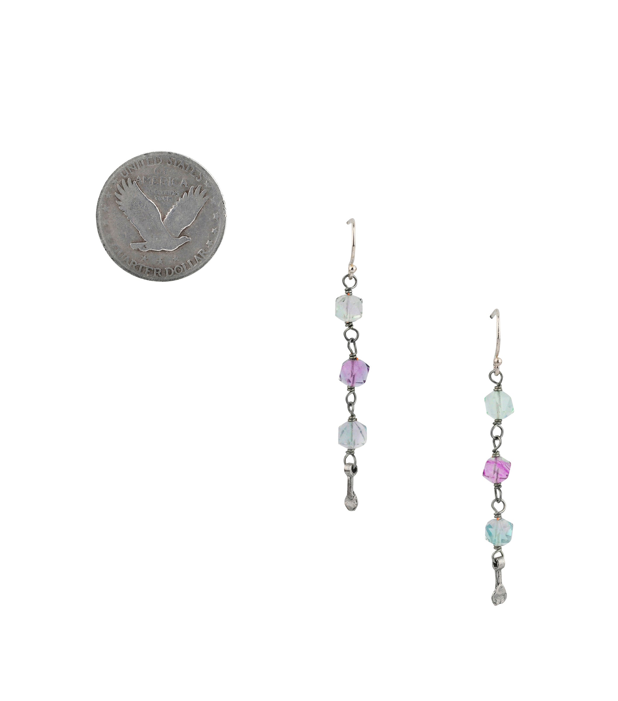 Fluorite rosary style dangle earrings floating on Sterling Silver ear wires next to coin for scale