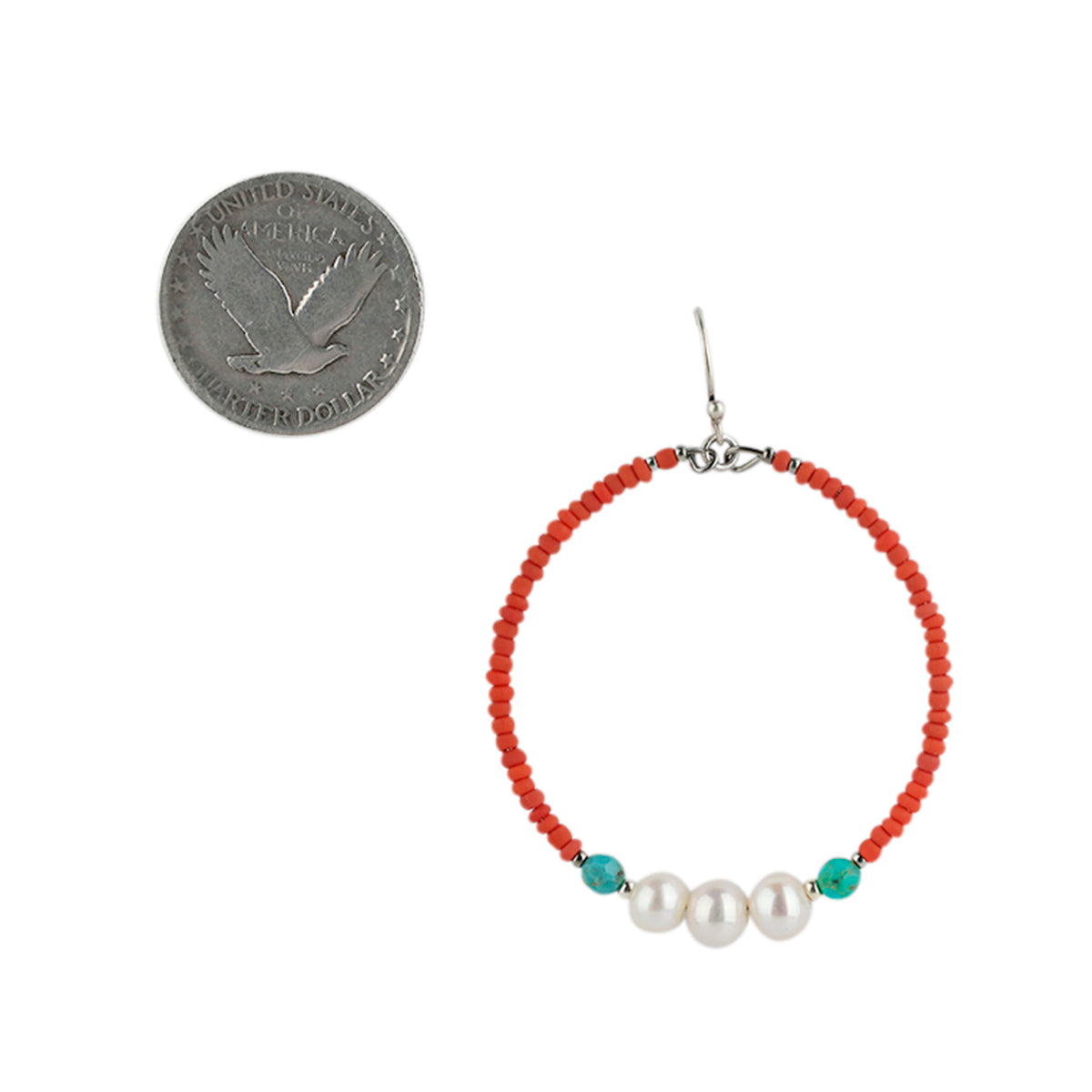 Sterling silver hoop earrings with turquoise and pearl bead accents.