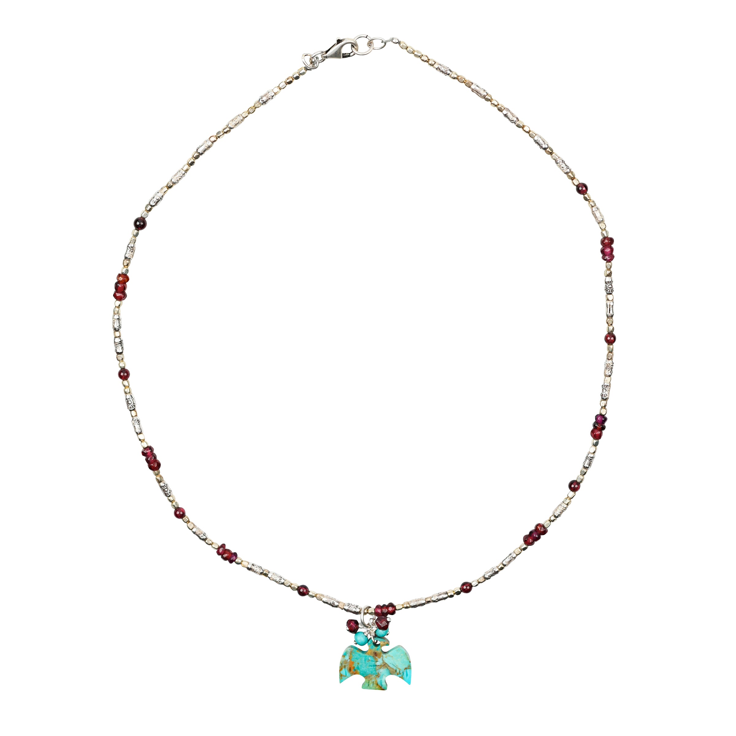 A beaded necklace strung with Sterling Silver beading and Garnet with a Turquoise Thunderbird Pendant.