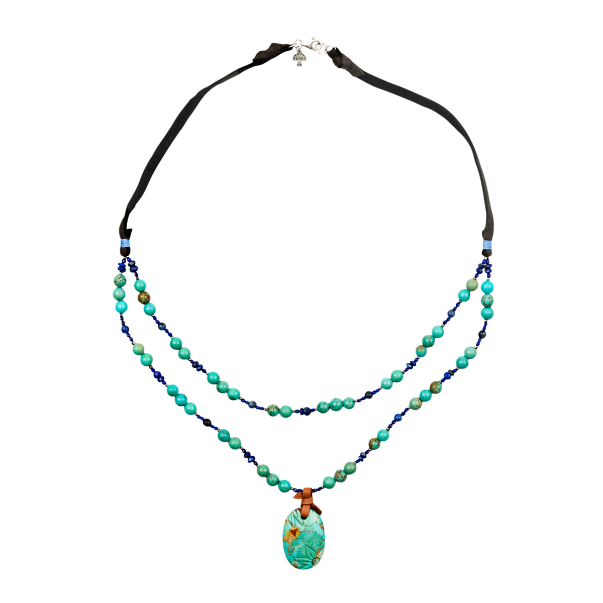 Beaded, layered necklace featuring a carved Turquoise stone pendant of flowers, beaded with lapis and turquoise strung on soft deerskin leather.