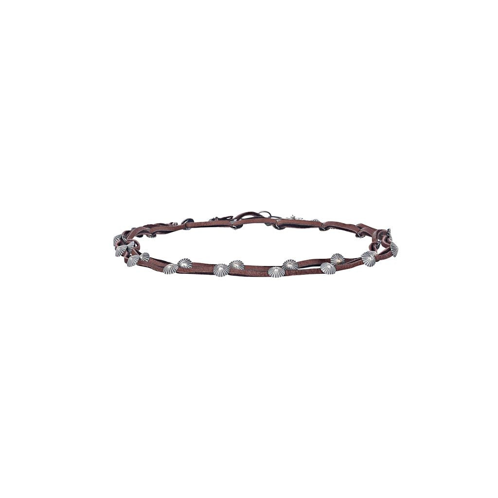 Handcrafted from soft deerskin, this double wrap hatband features classic sterling silver concho buttons. Elevate your style with this unique and versatile accessory.