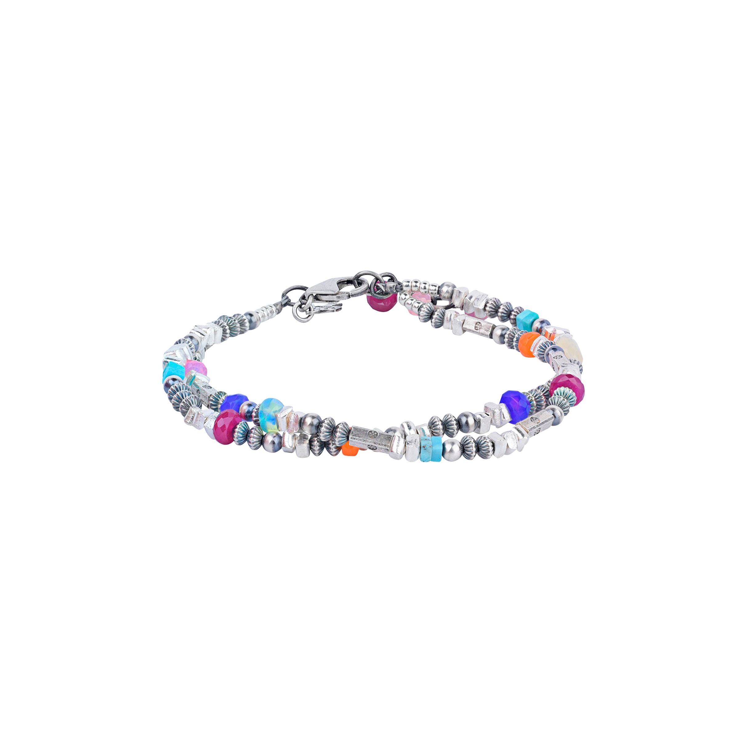 Peyote Bird original Lucky Charms bracelet. A beaded two-strand bracelet featuring sterling silver, blue turquoise, Ethiopian opals, and ruby.