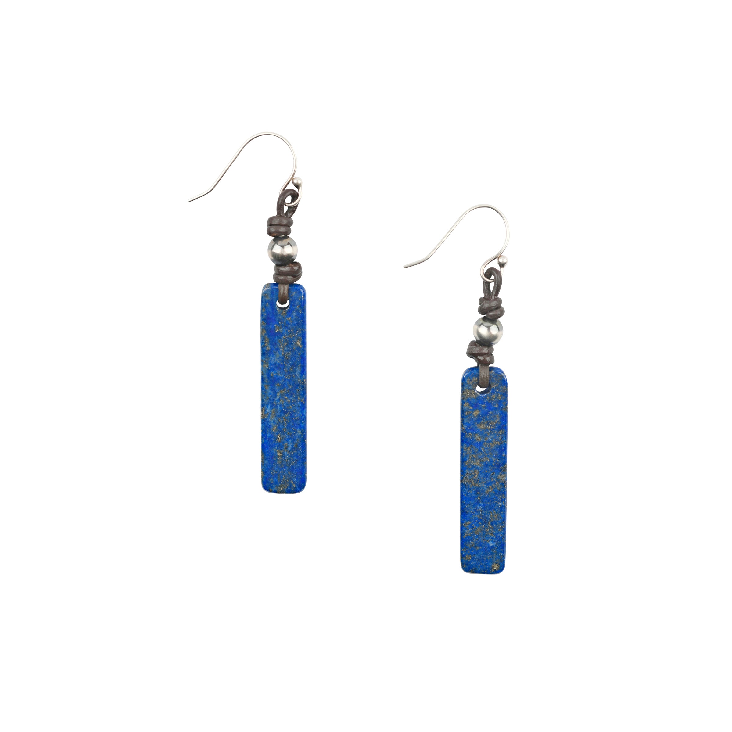 The Lapis Spires Earrings feature a long piece of Lapis Lazuli topped with a Desert Pearl on leather cord. Pair with your favorite Denim look! These earrings were a Sundance Catalog favorite for many years.