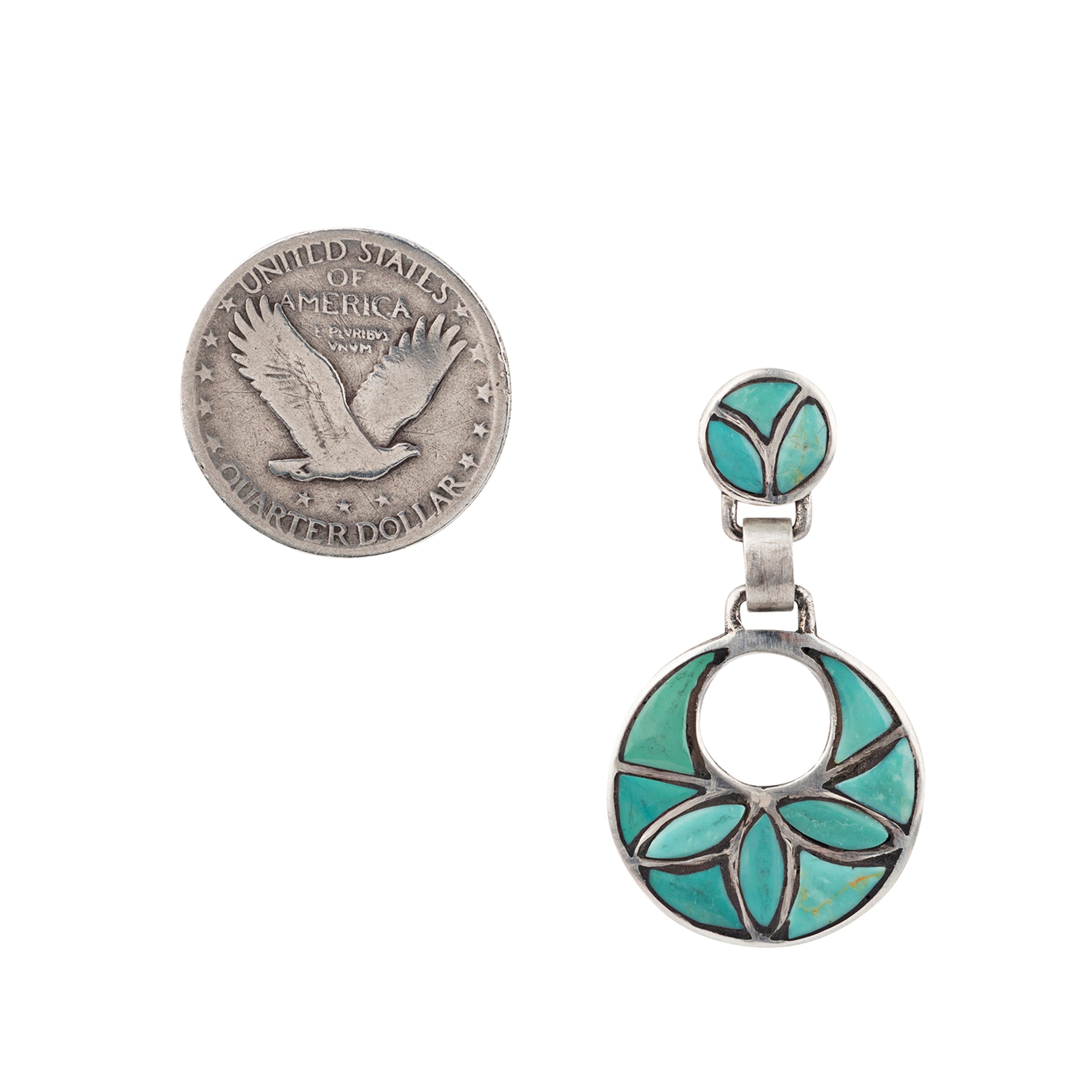 A pair of blue turquoise lotus earrings with a circular design and leaf patterns, set in sterling silver.