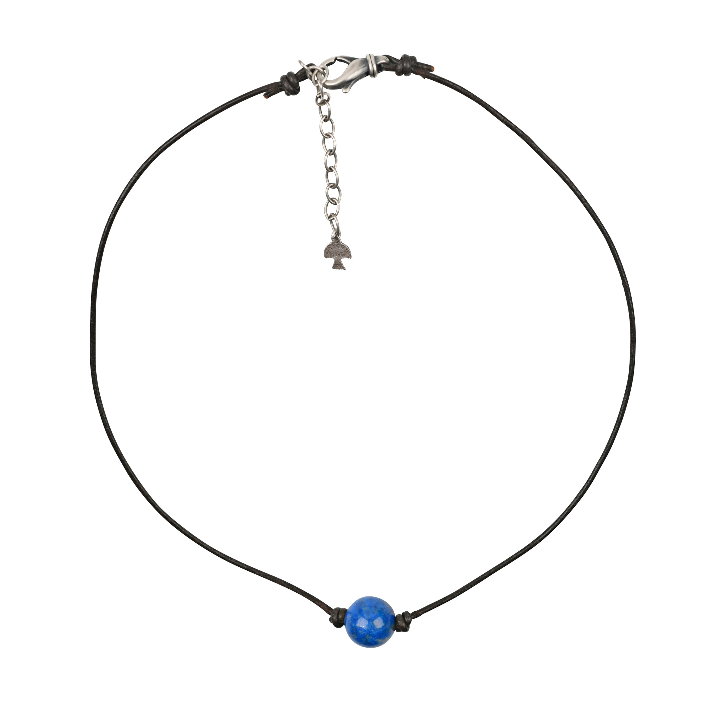 This beaded necklace features a large Lapis bead on knotted brown leather cord