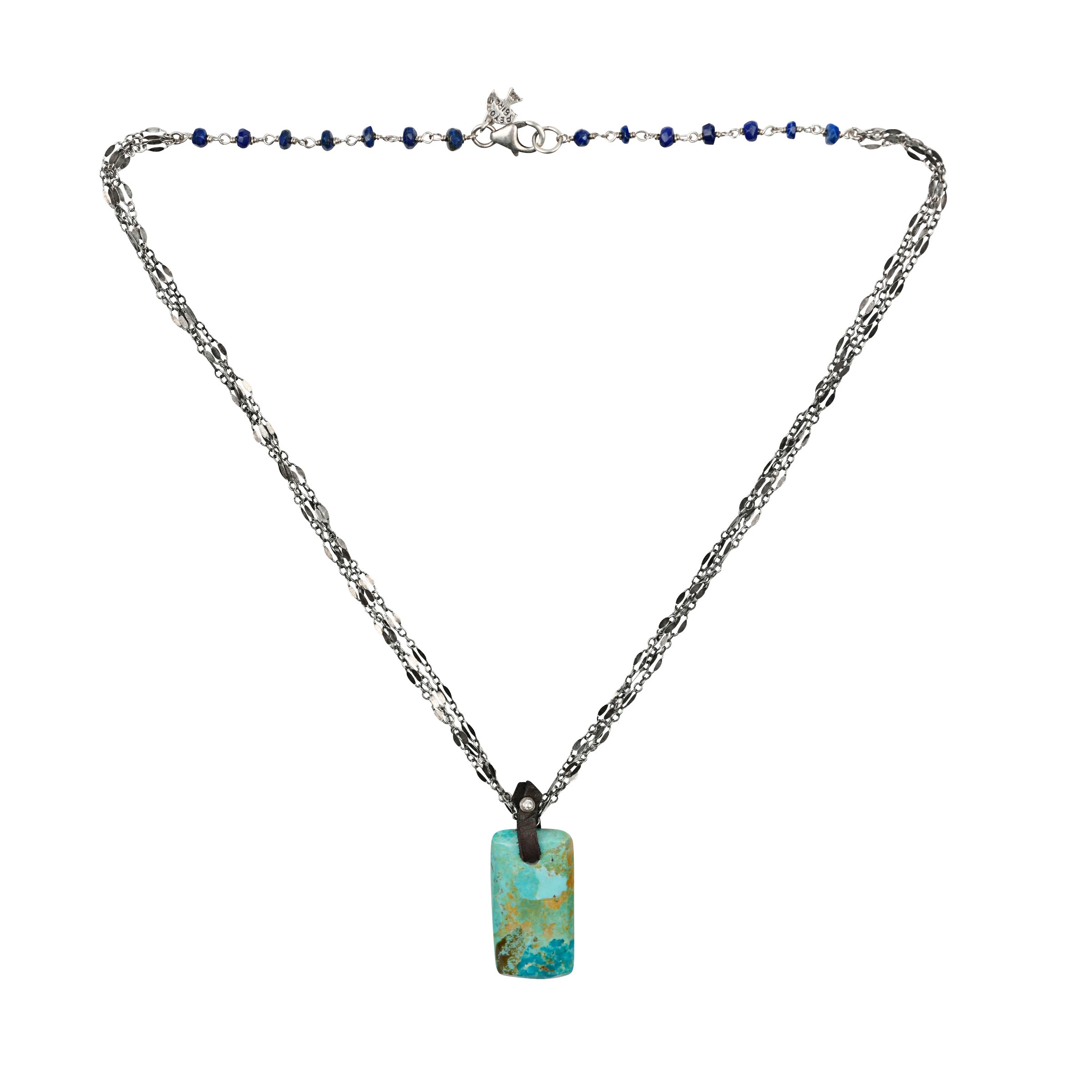 A multi-strand chain necklace featuring a large Turquoise Pendant and lapis beading. This piece has been featured in the Sundance Catalog!