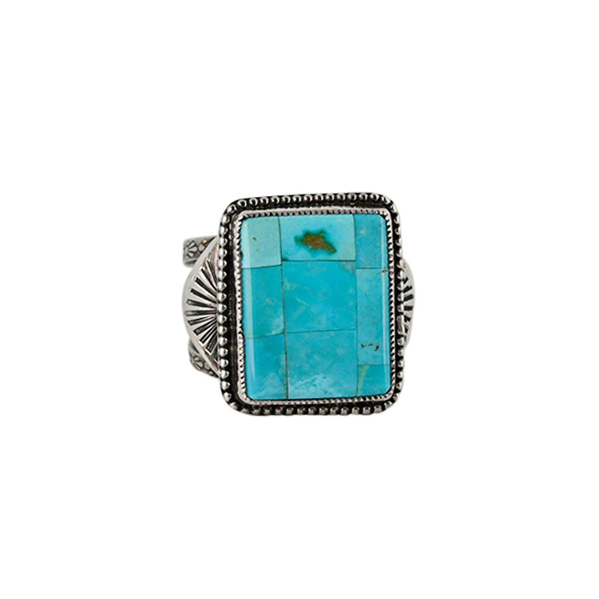A mosaic ring of Blue Turquoise set in Sterling Silver. A beloved piece from the Sundance Catalog.